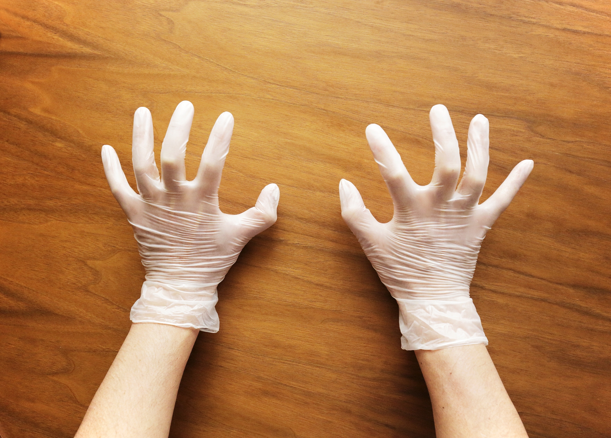 hand with protective gloves