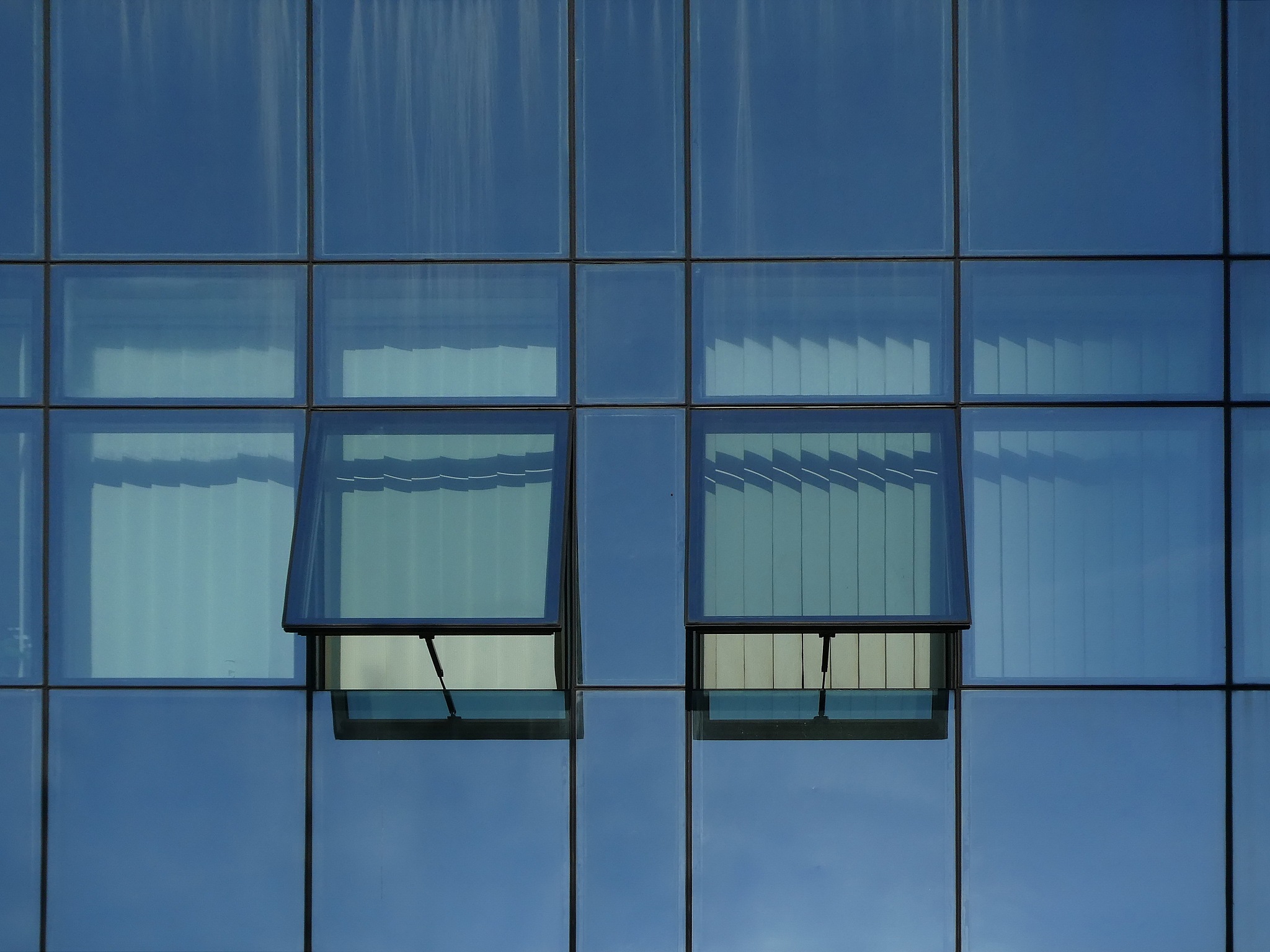 modern glass with  two opened windows