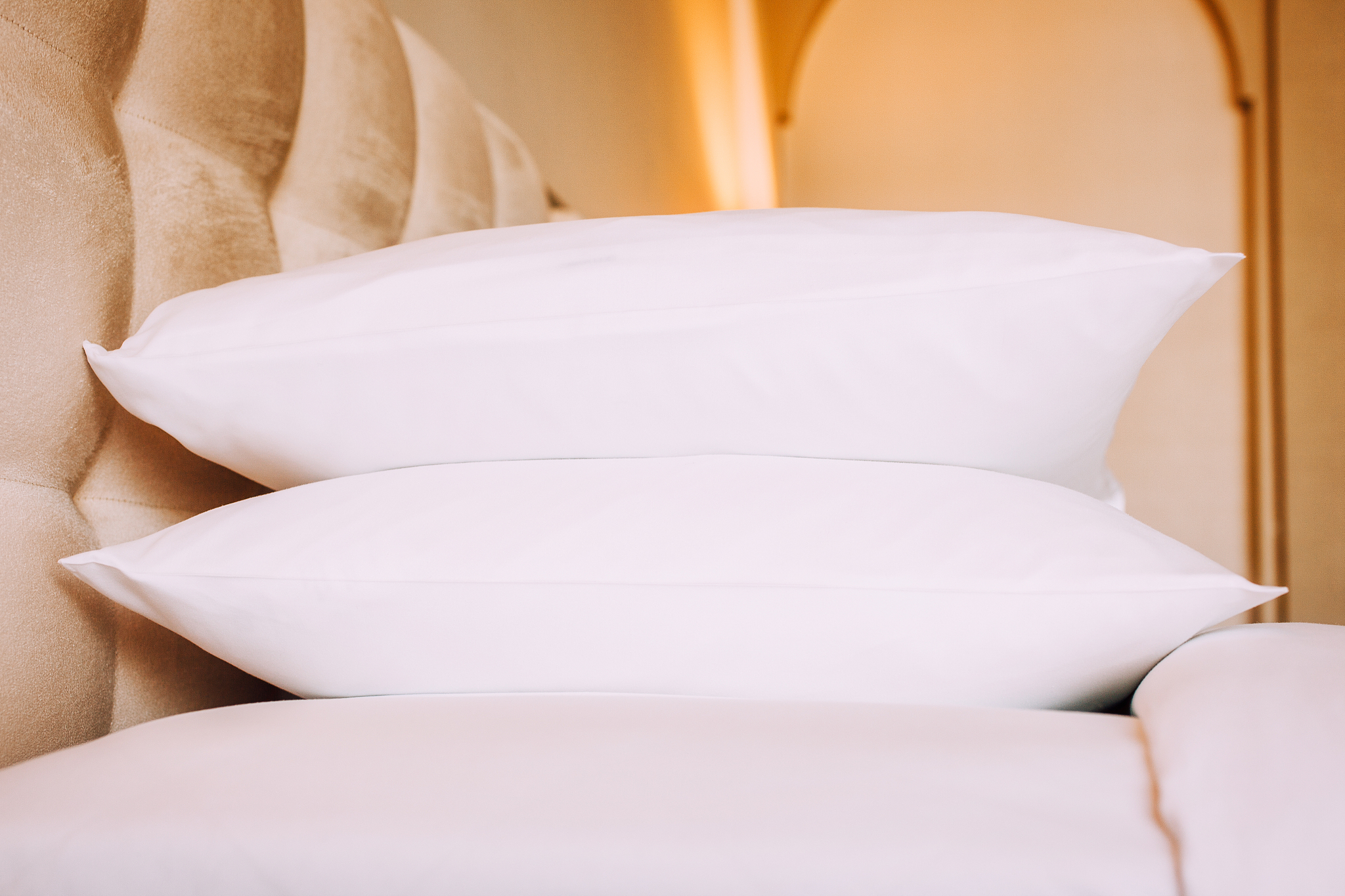 pillows arranged on bed