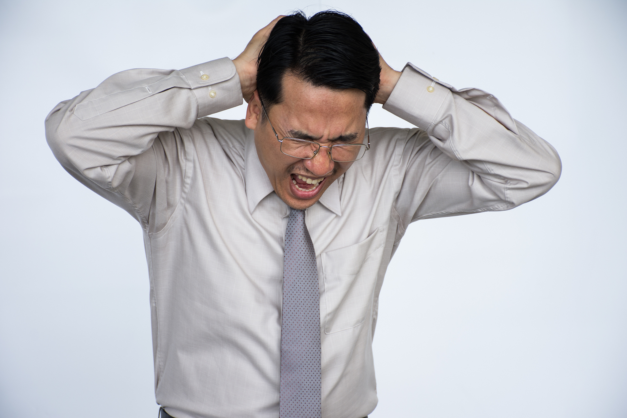 businessman put his hands on his head,man worries about, isolate
