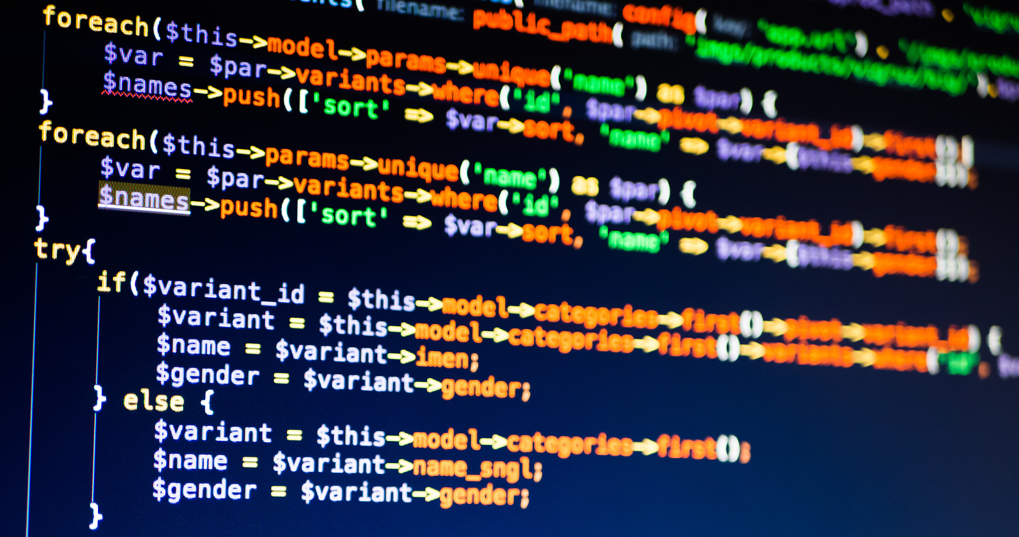 lines of php code on the screen, extreme close-up.