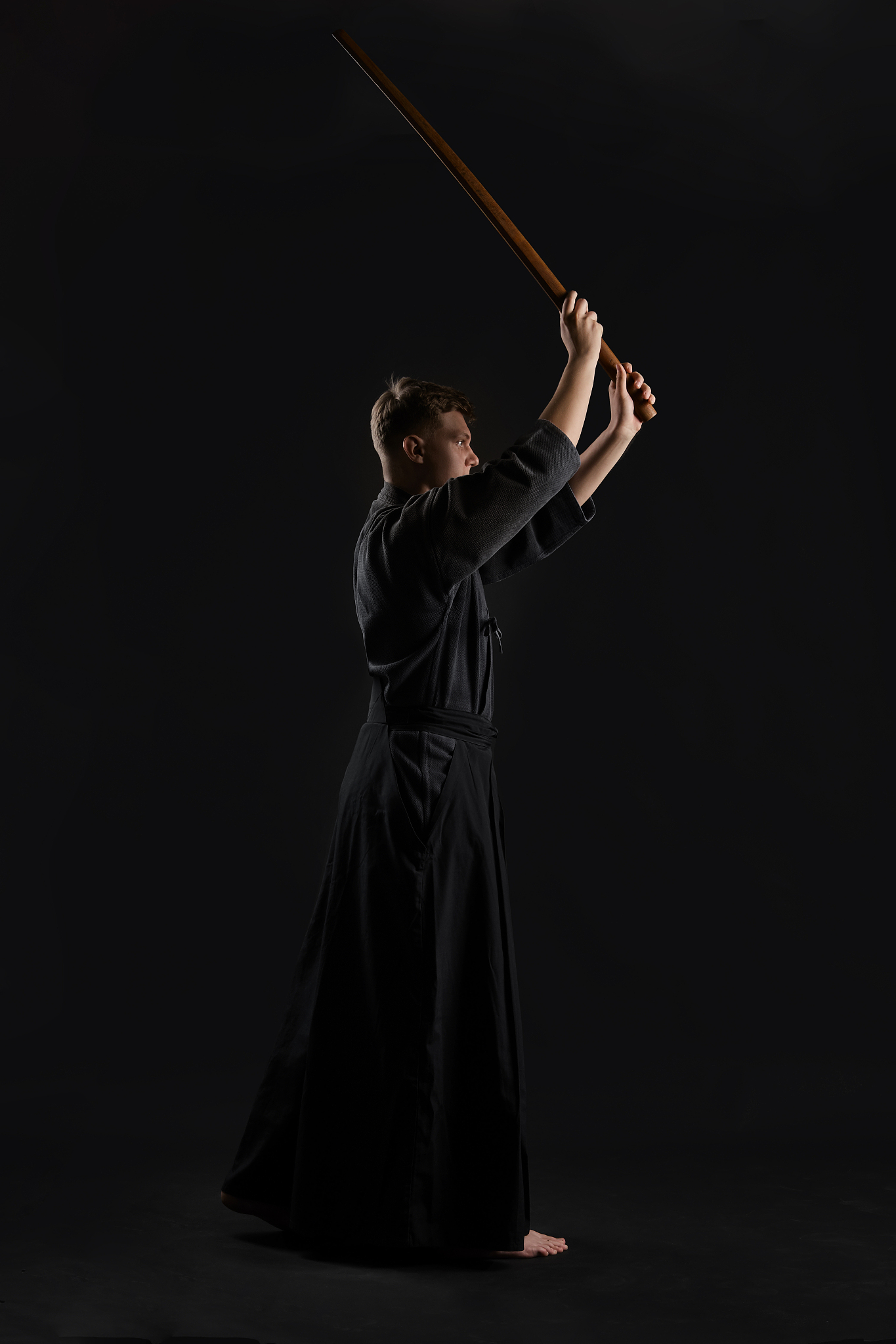 kendo guru wearing in a traditional japanese kimono is practicin