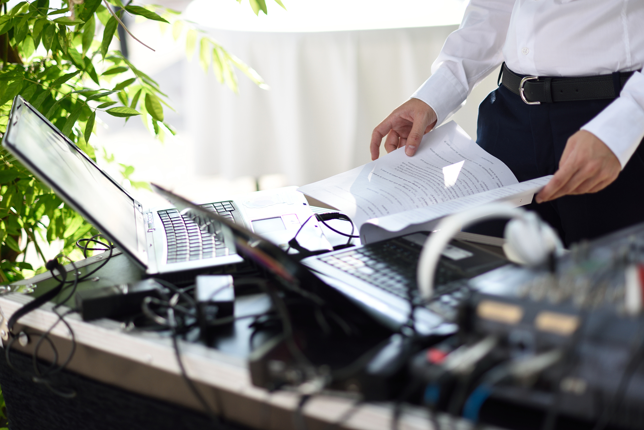 dj table with laptop and wedding texts