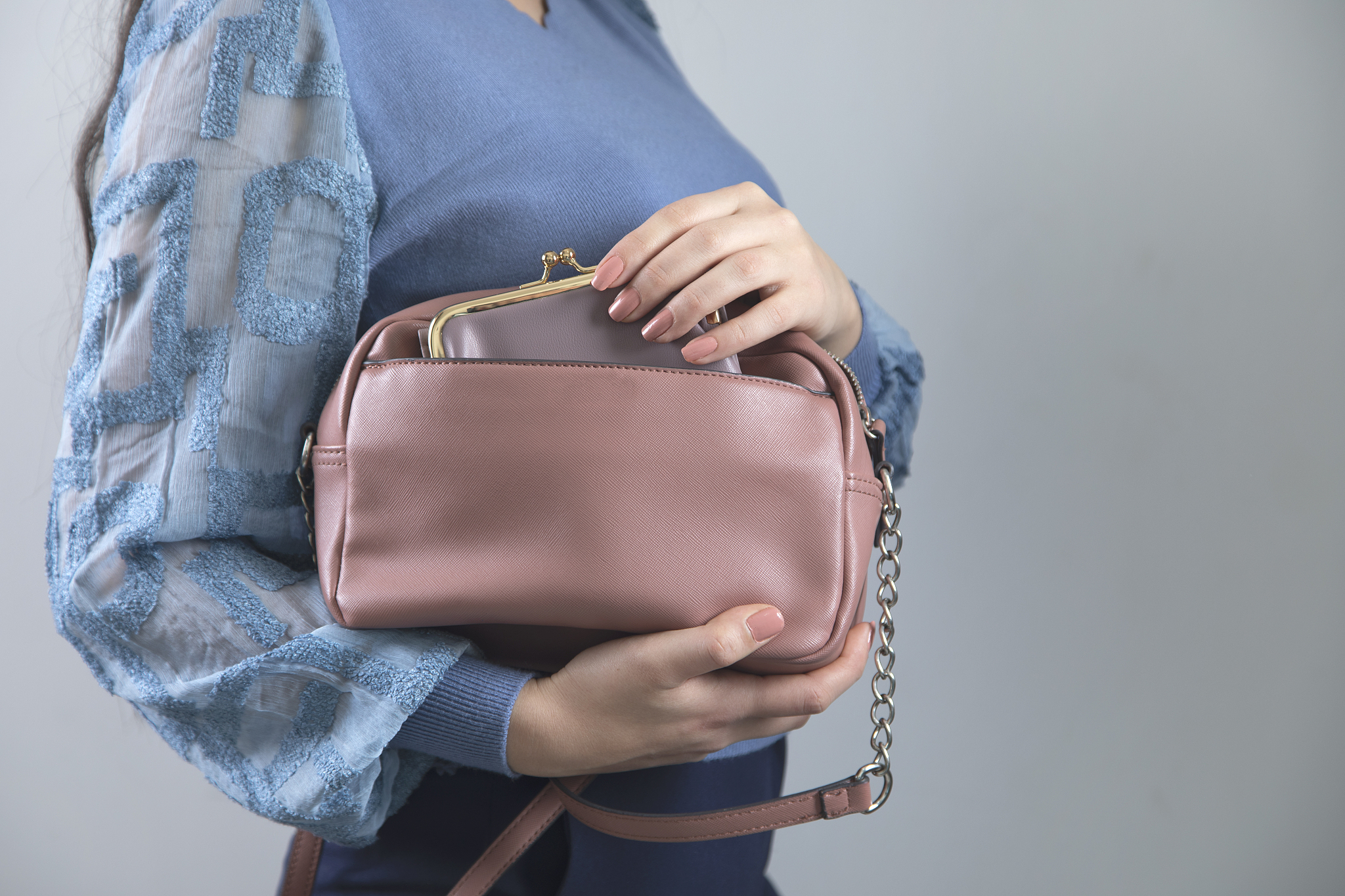 woman hand pink bag with wallet