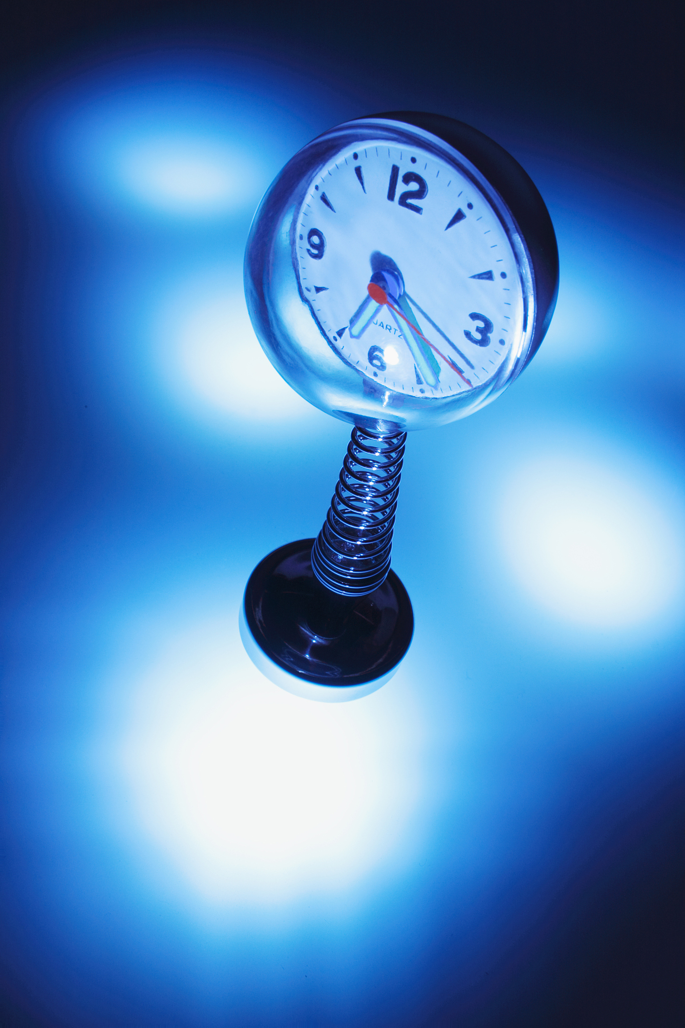 clock on spring stand