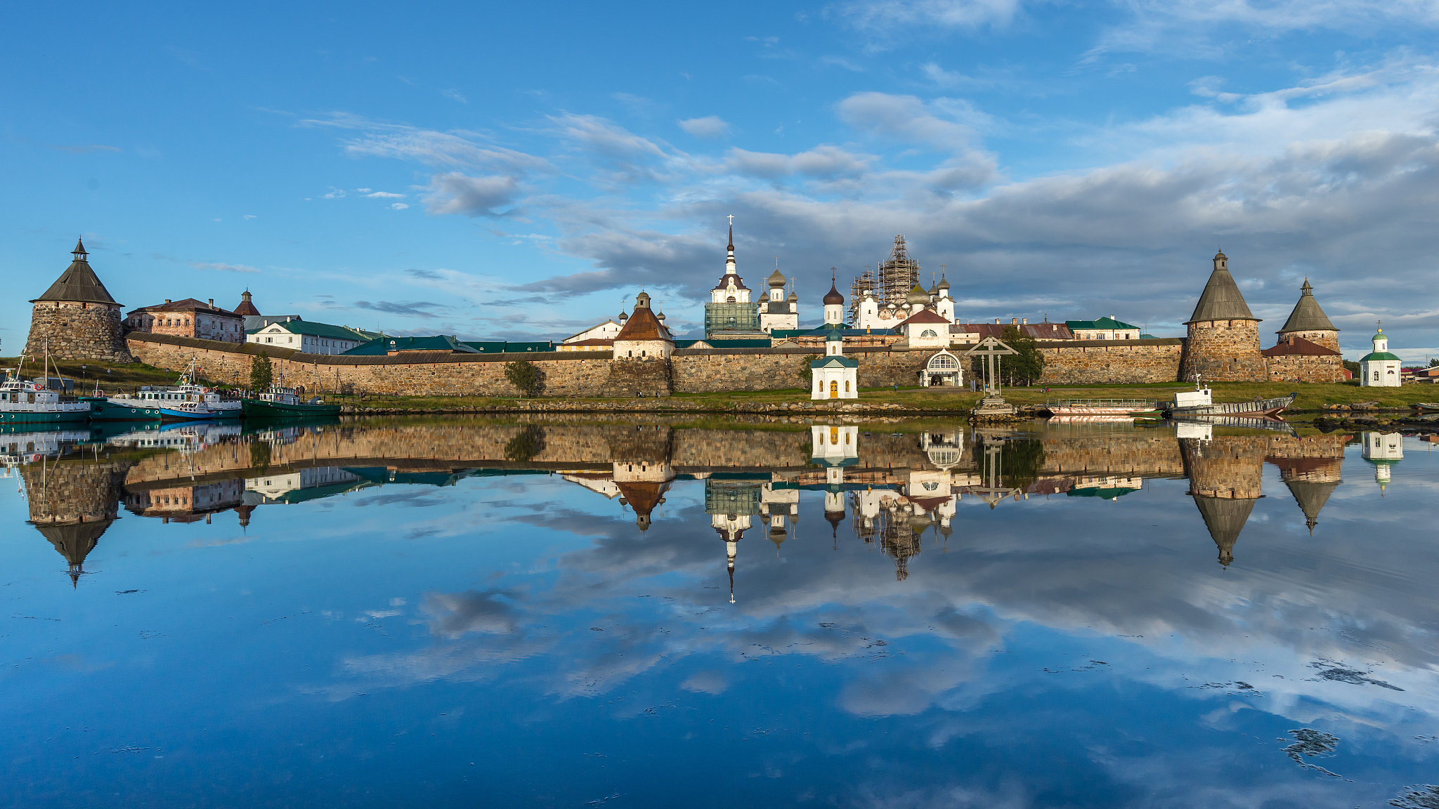 beautiful symmetric  mirroring reflection of solovetsky kremlin 