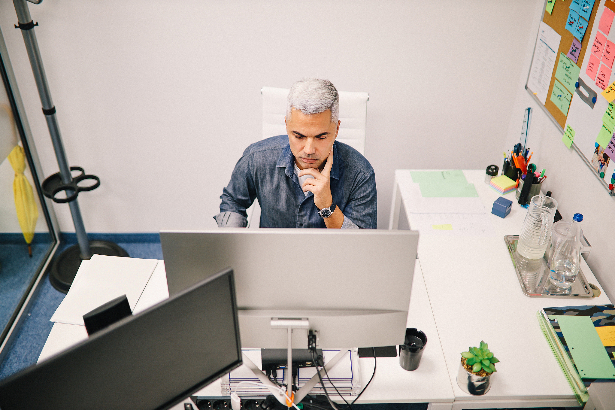 man finishing work in the office