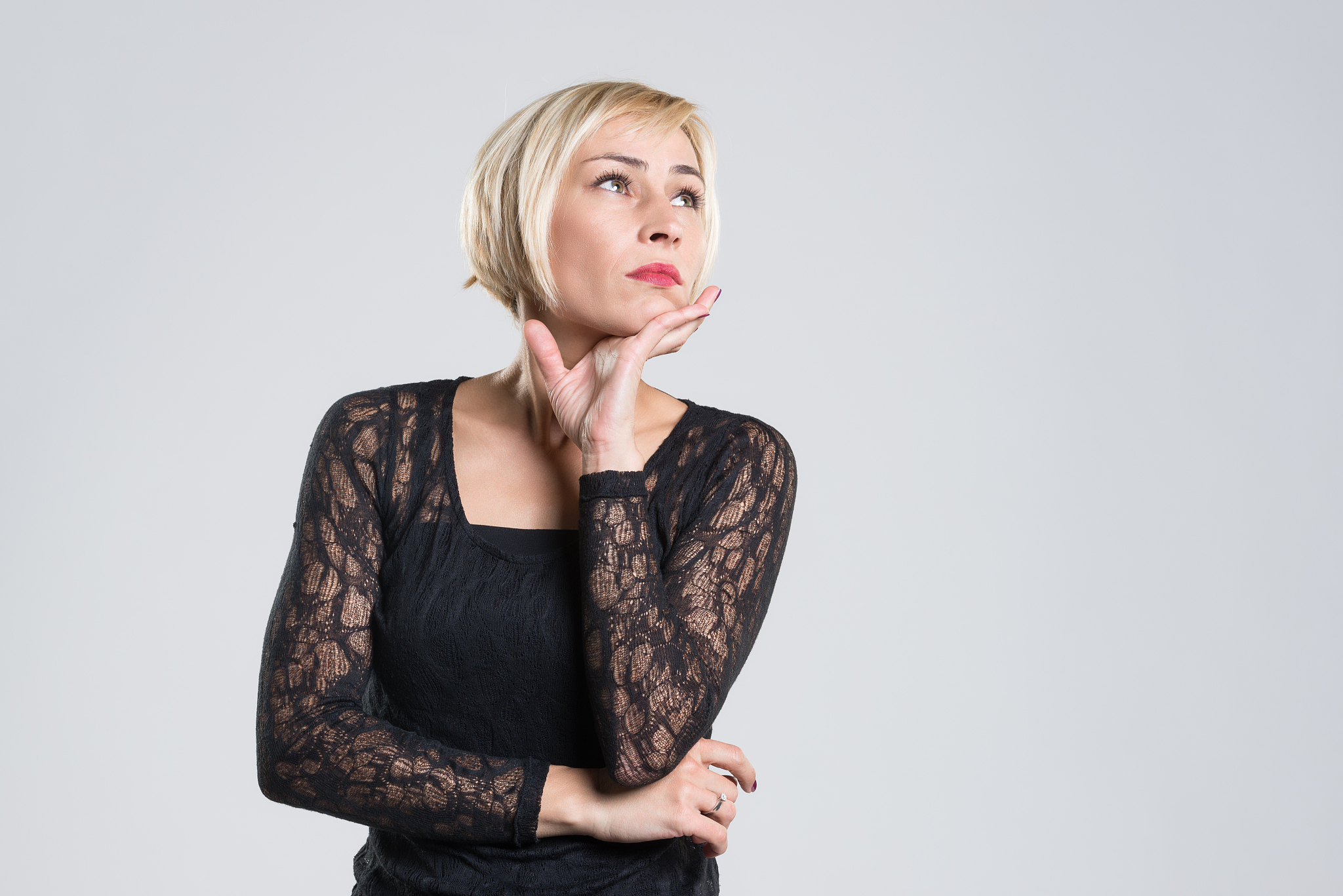 blonde woman day dreaming