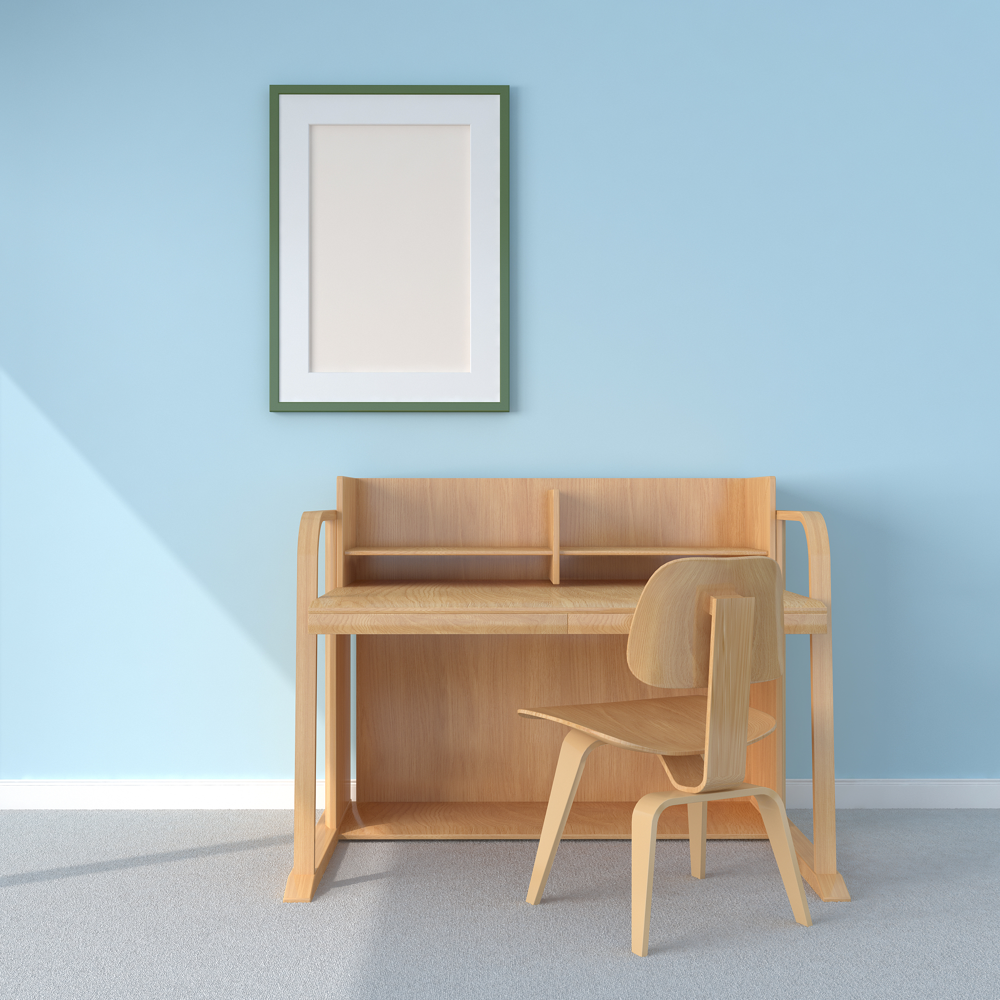 wooden desk and chair with empty frame on blue wall