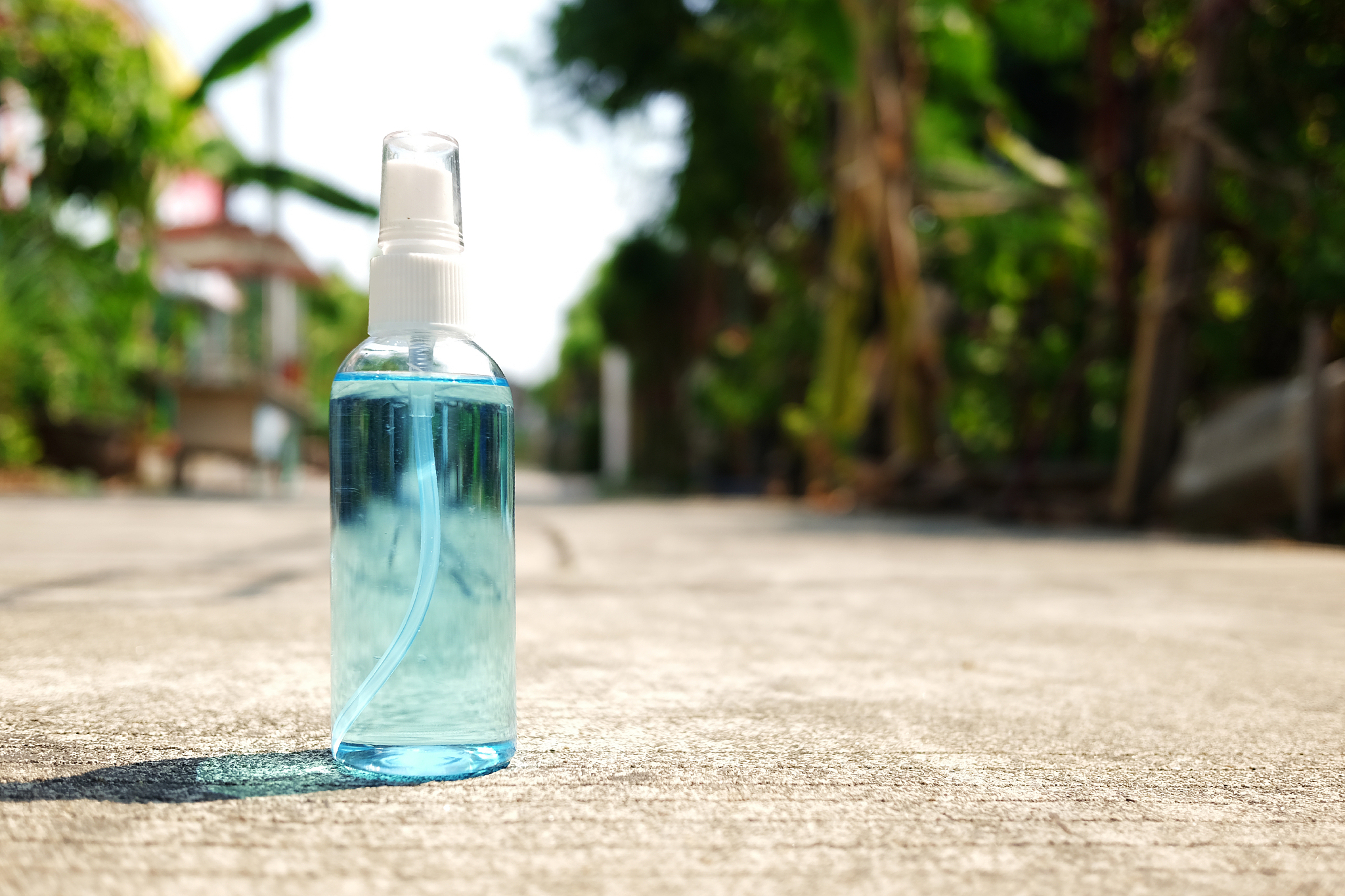 a bottle of ethanol or ethyl alcohol spray for based hand rub is