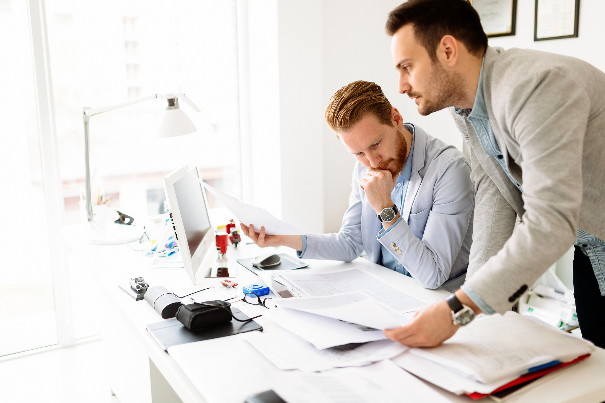 coworkers working on project together