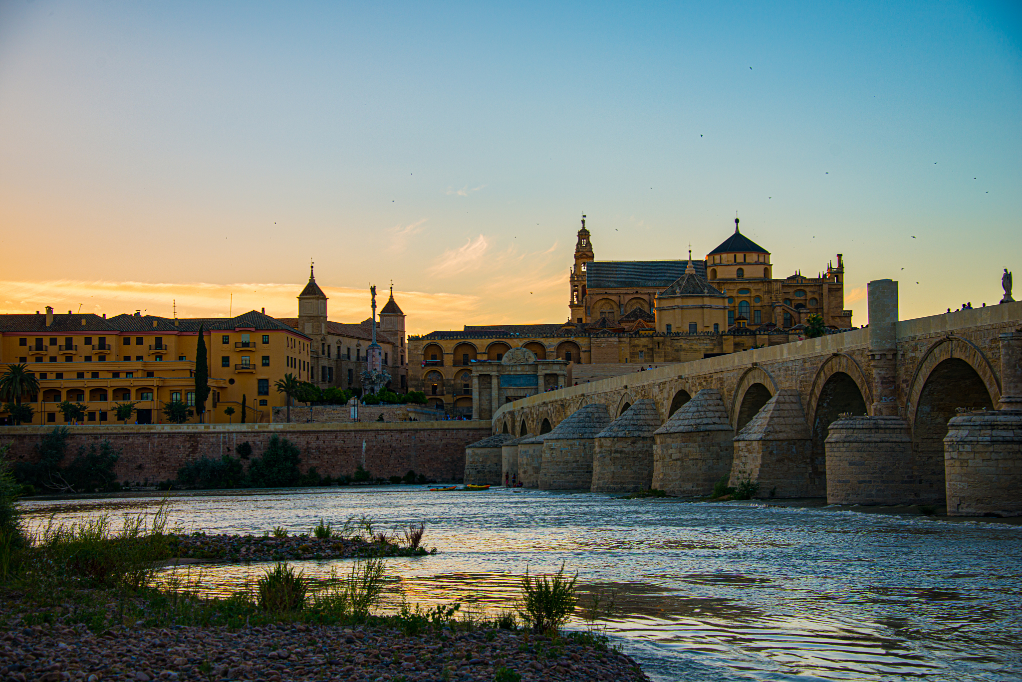 mosque-cathedral and roman bridge of cordoba, andalusia, spain
