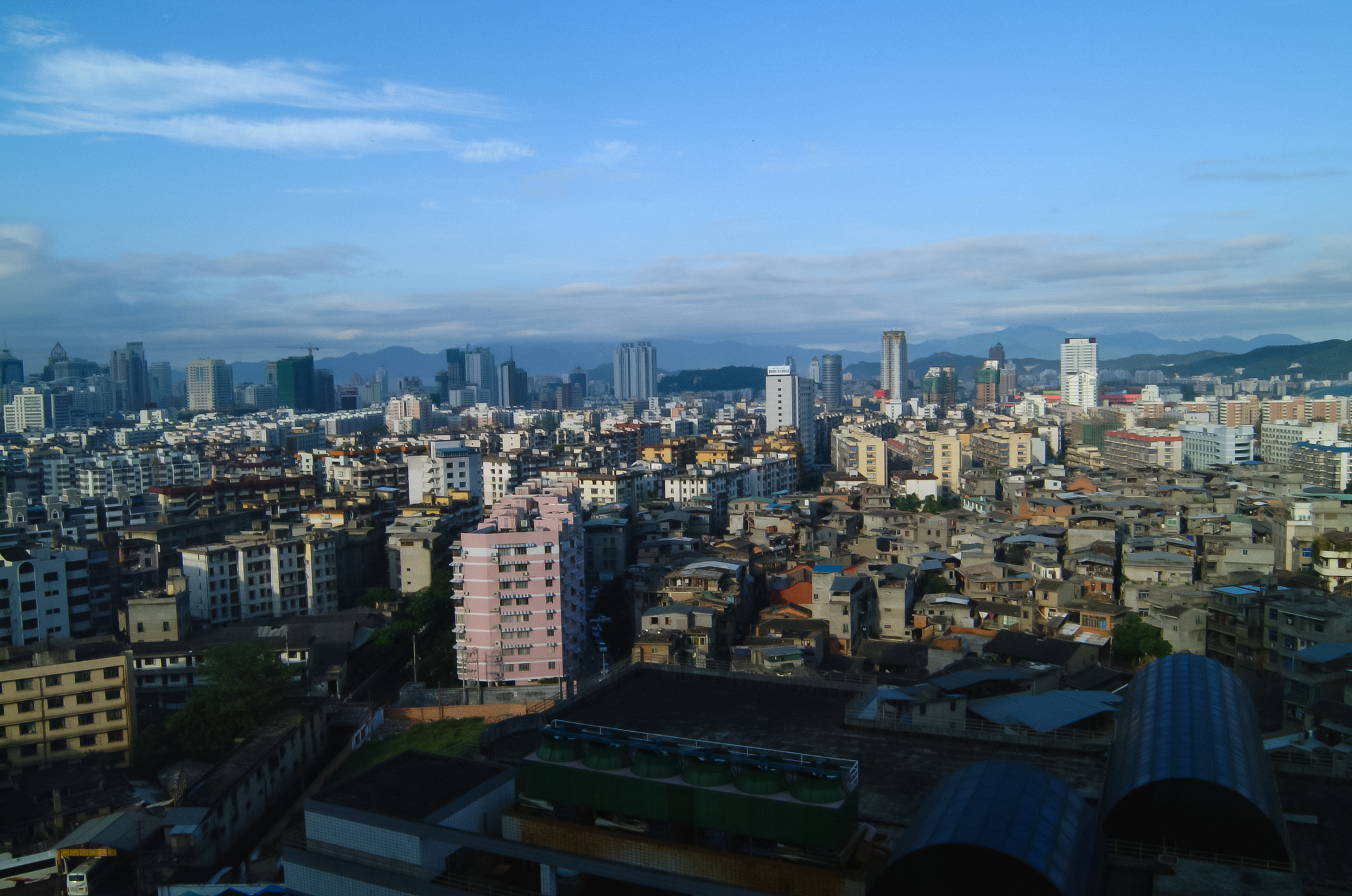 high angle view of buildings in city against sky