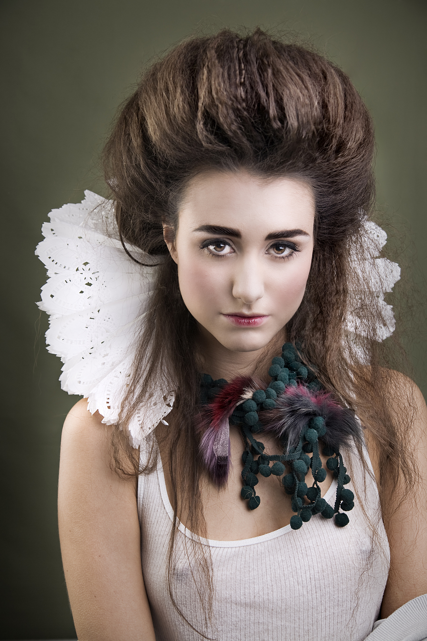young woman dressed as contemporary queen with collar