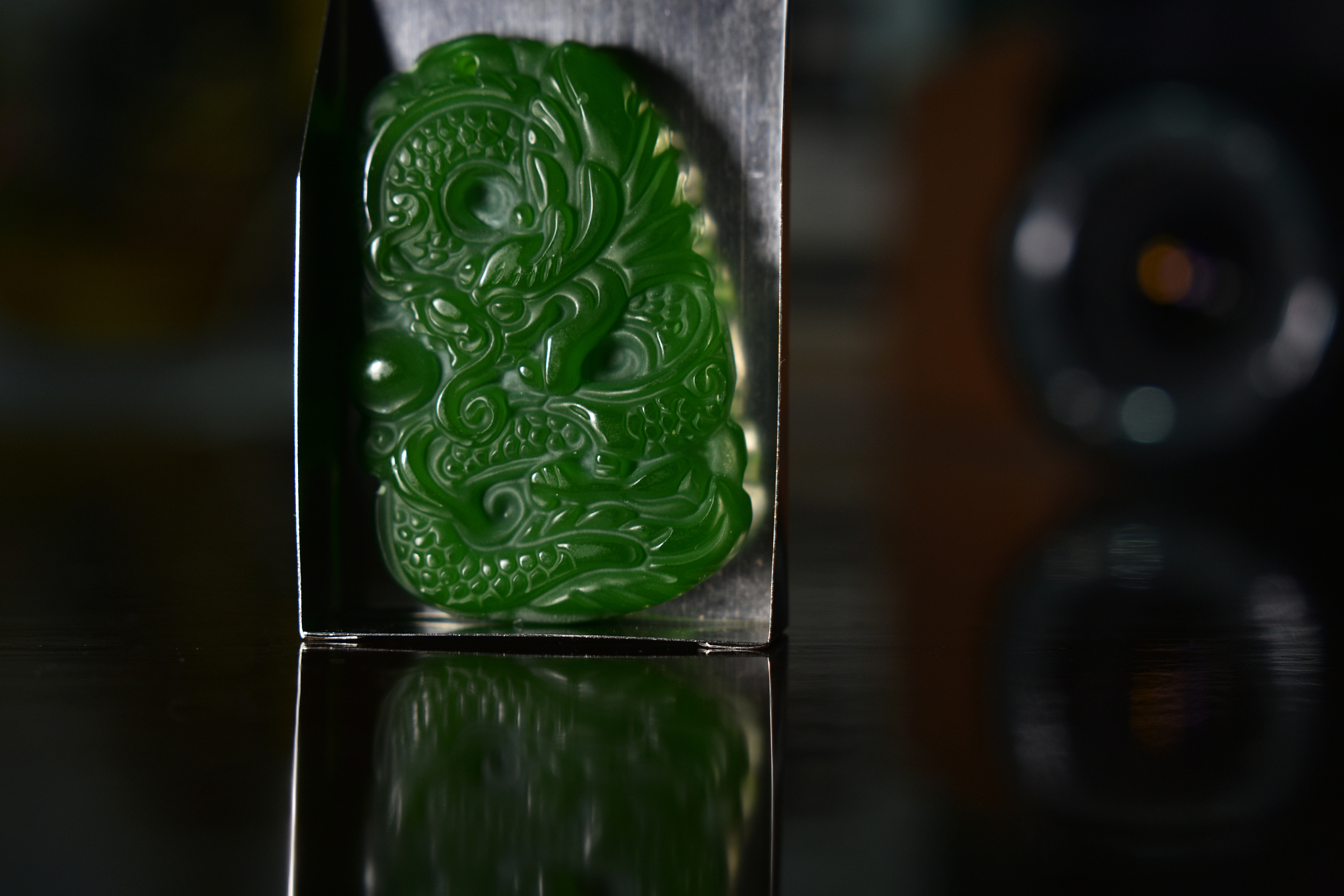jade carving it is a green dragon.