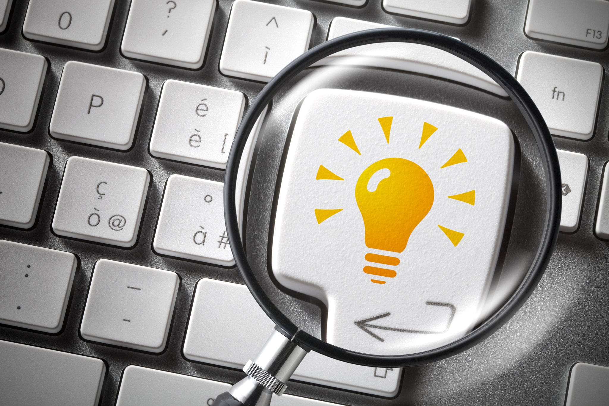 computer key with a lightbulb icon
