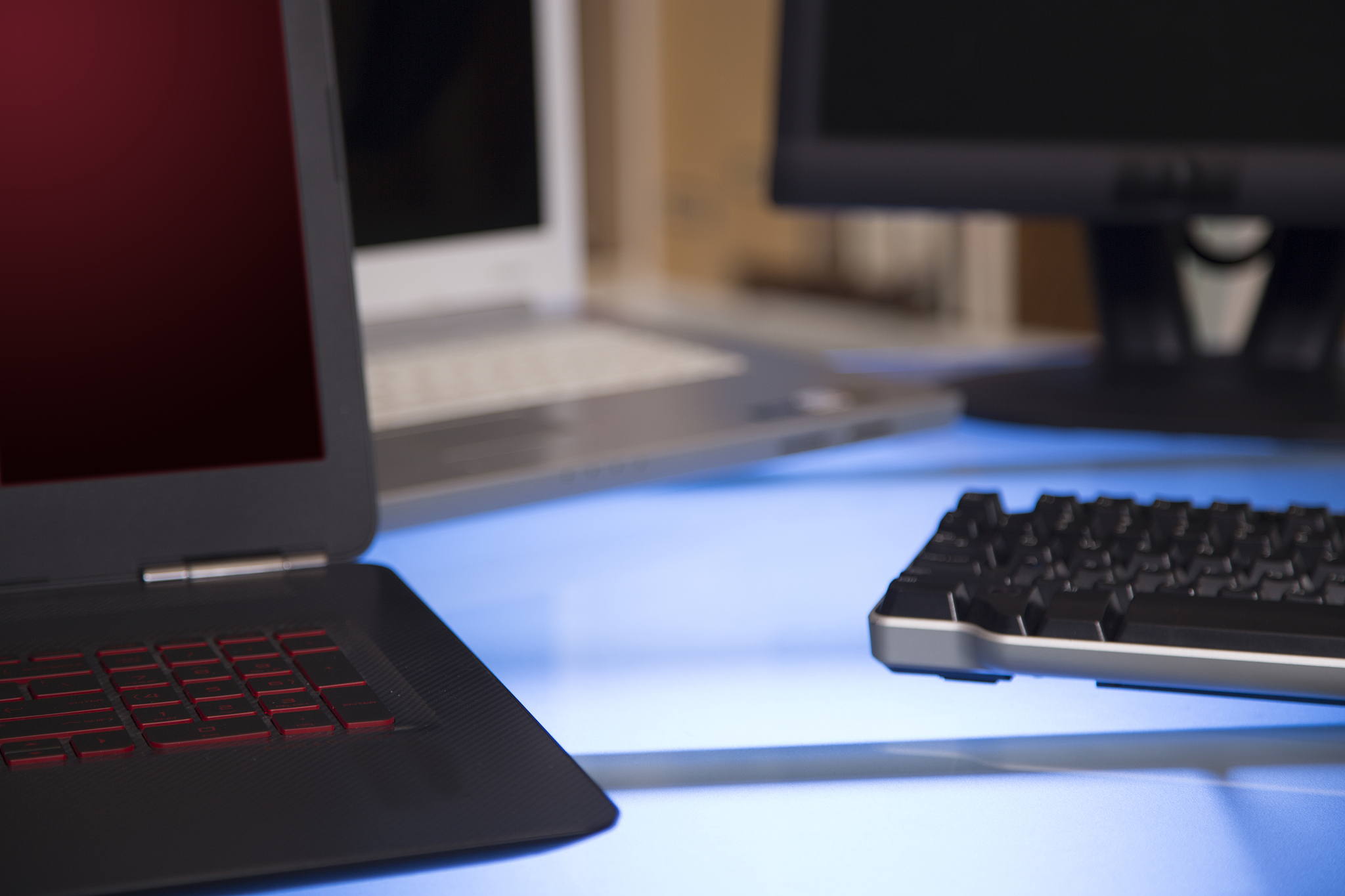 computers on glass top office desk.