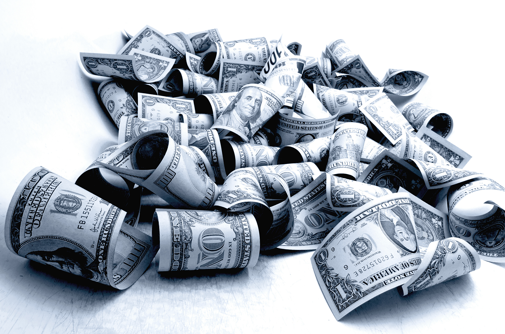 us dollars on a plane in black and white.