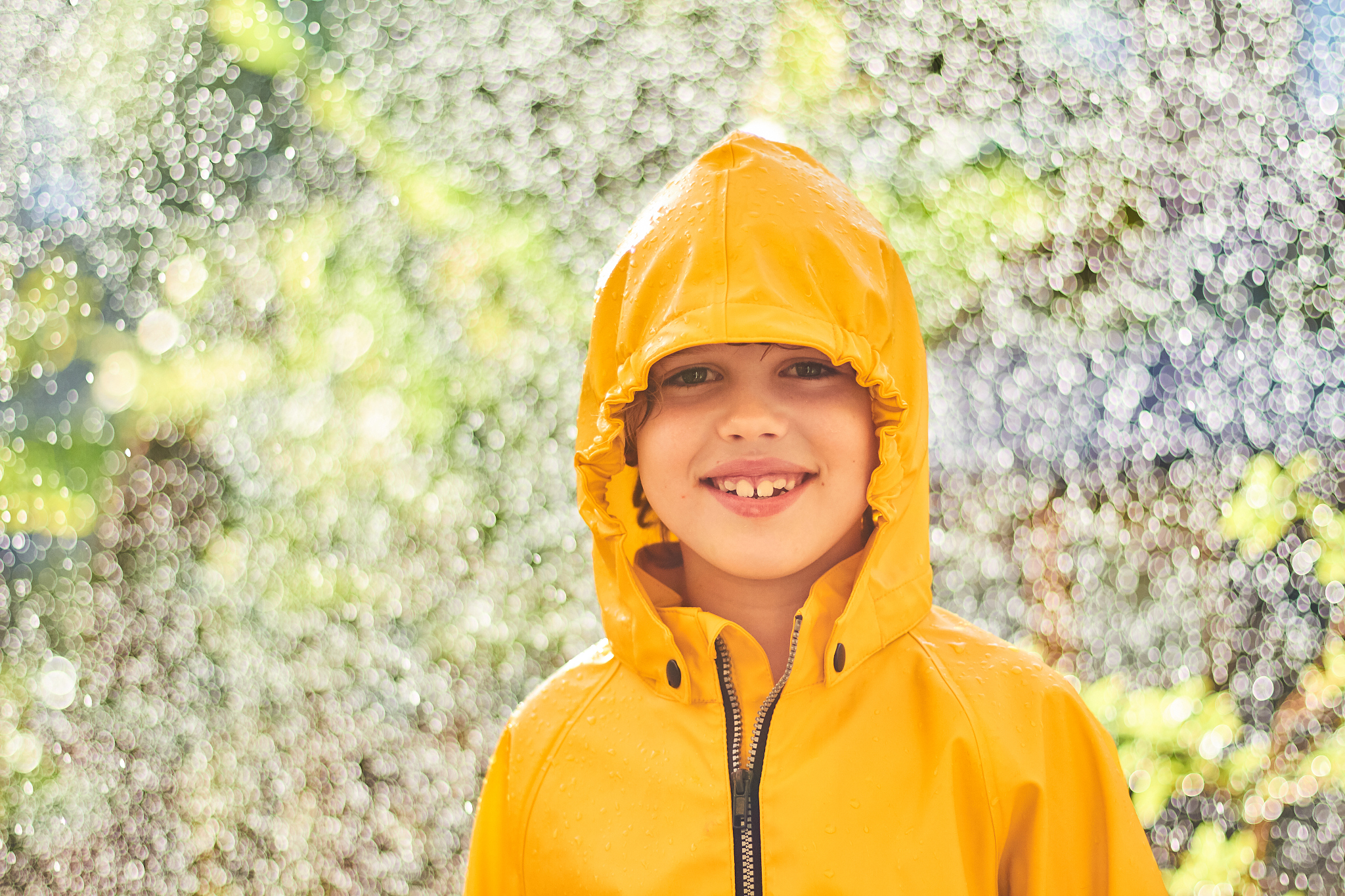 happy child enjoying the rain