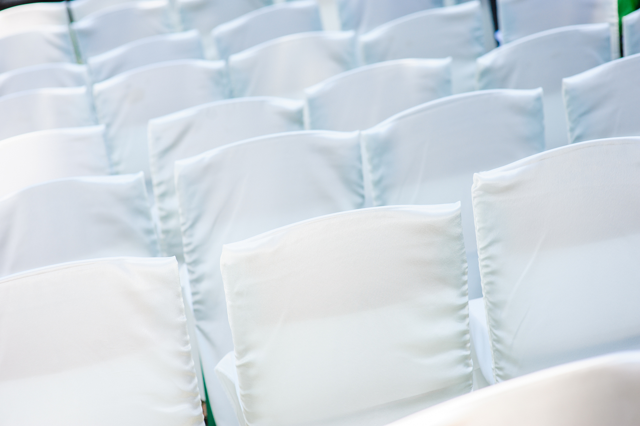 white wedding chairs for the ceremony