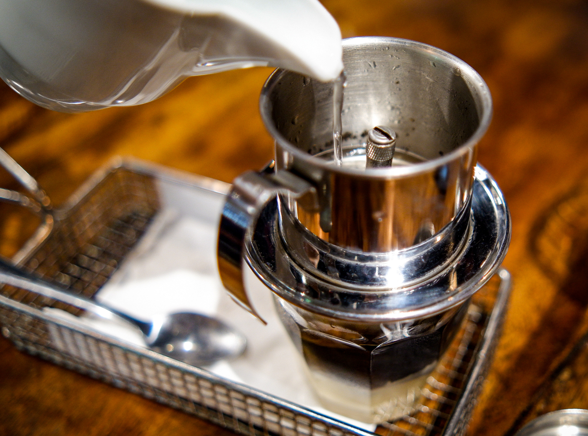 为什么咖啡机出液不满孔怎么解决