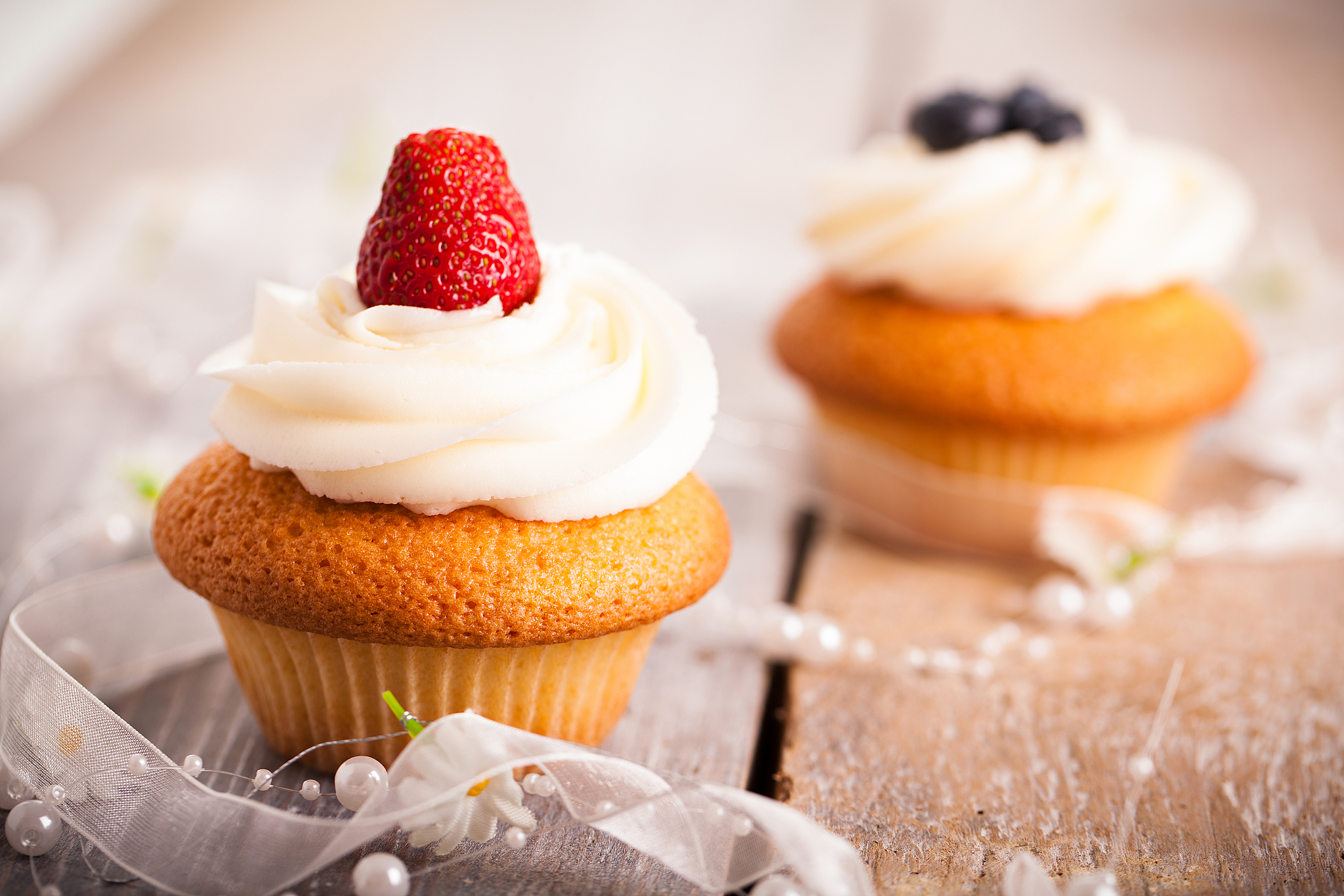 delicious cupcake with a strawberry on top
