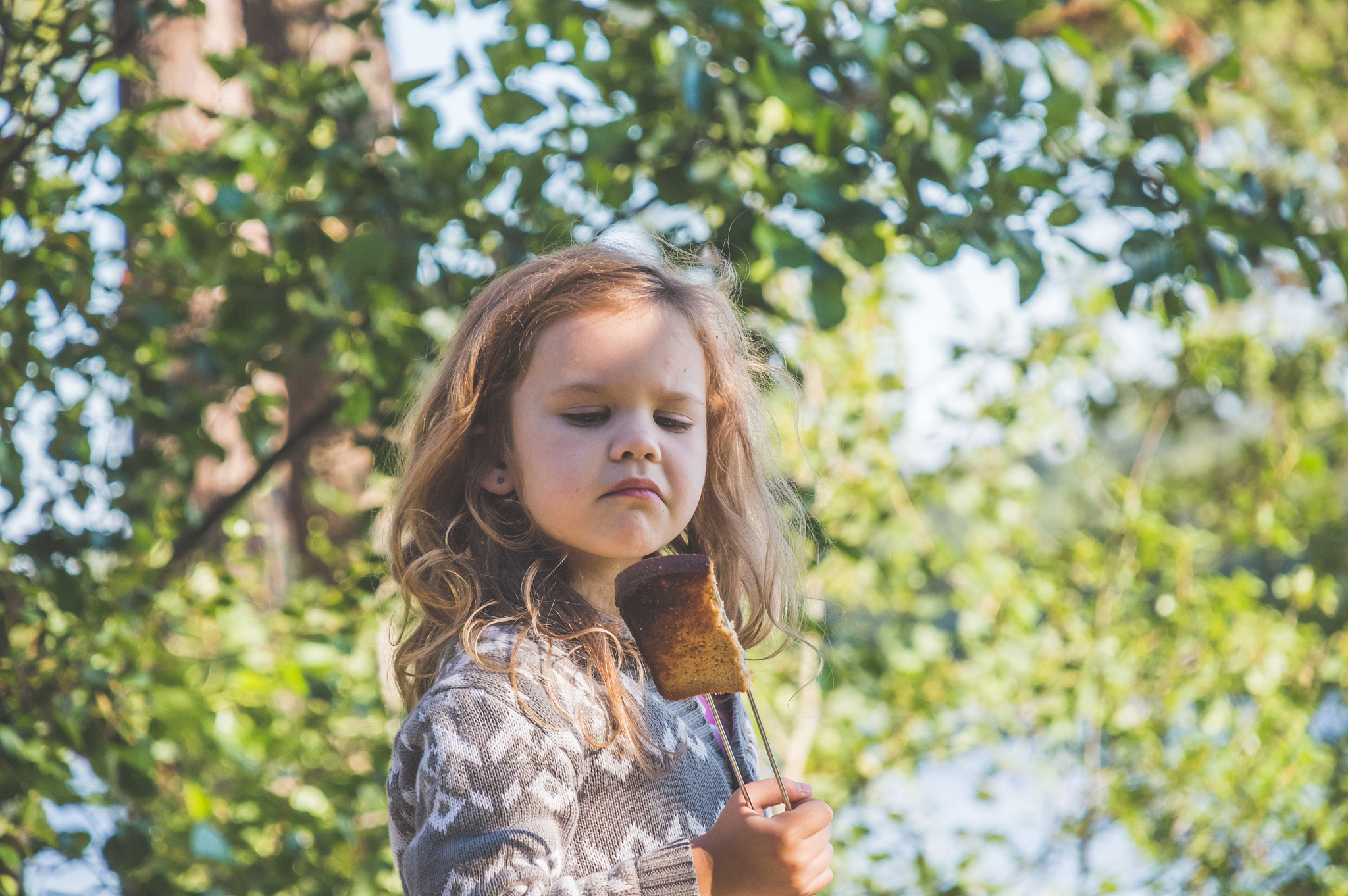 girl, child in a tourist water hike in the forest