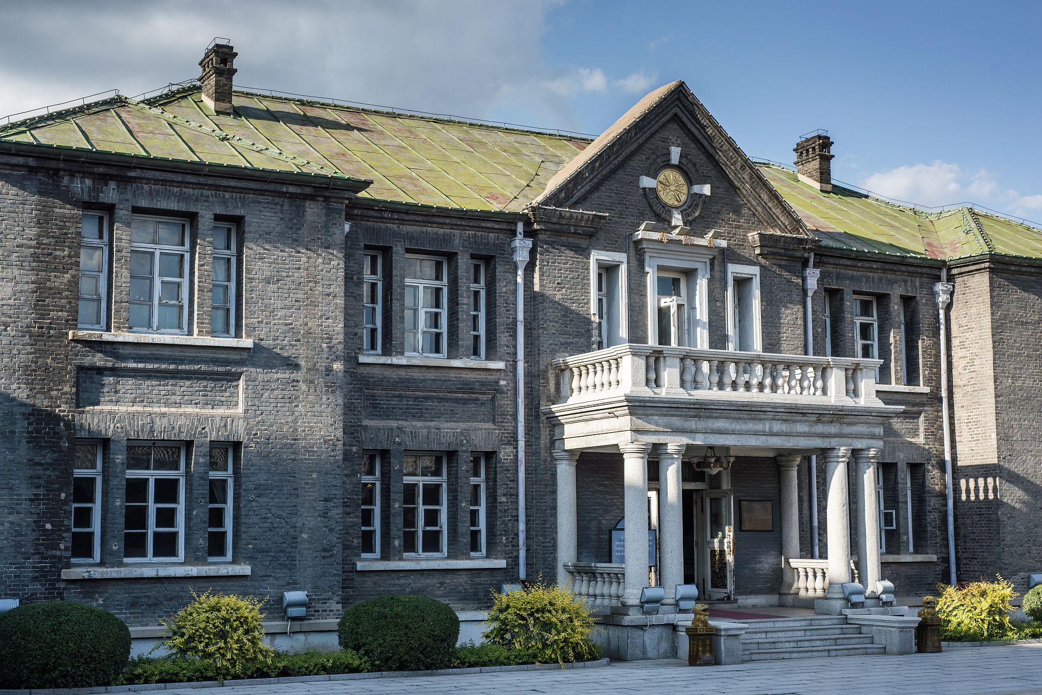 帮我写一份旅顺博物馆的调研报告的建筑风格