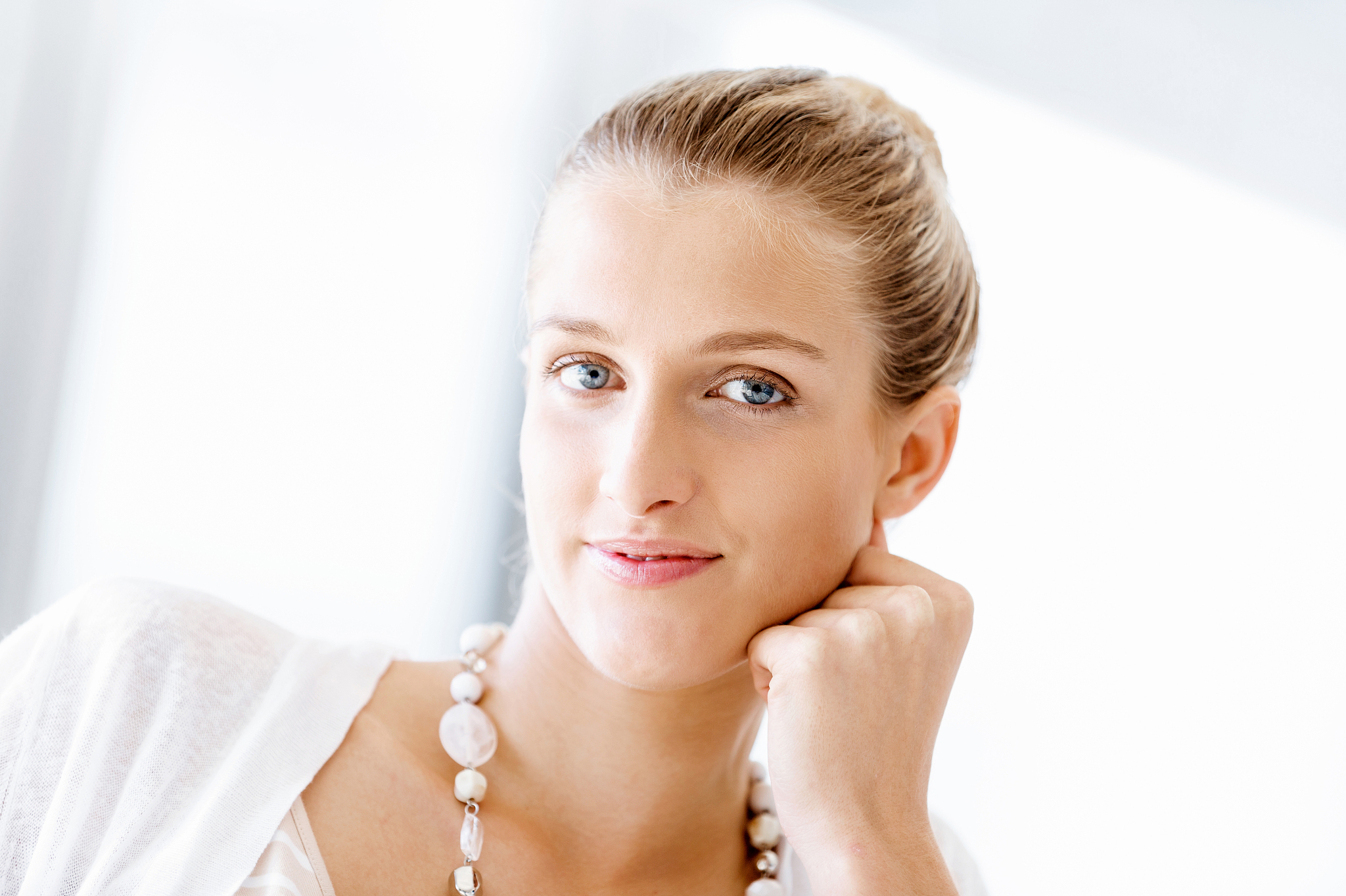attractive office worker sitting at desk. attractive woman sitti