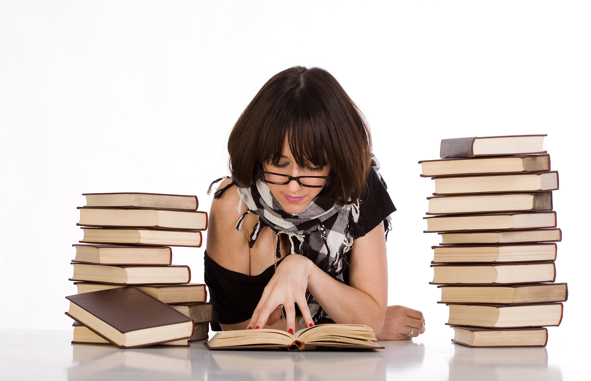 studying between two pile of books