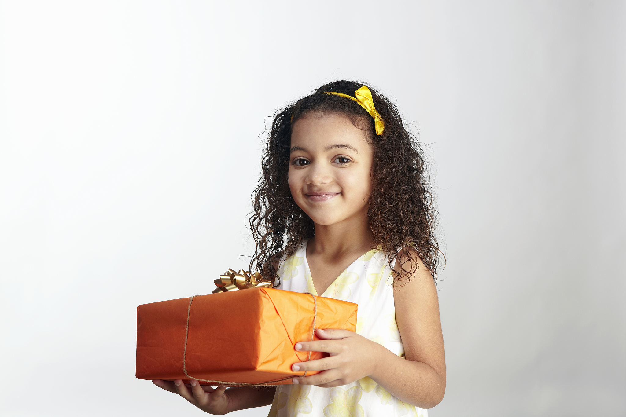 girl holds gift