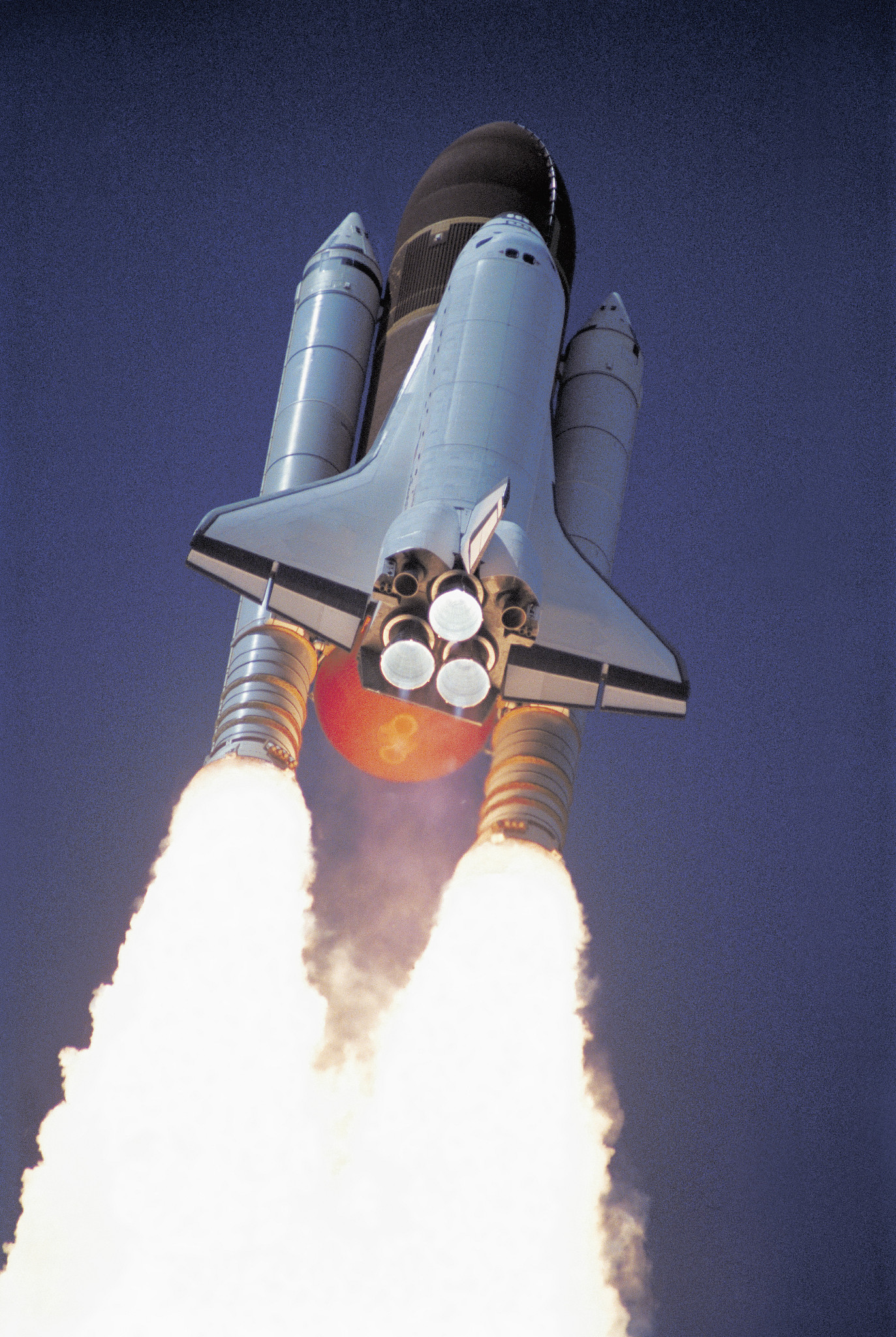 low angle view of a space shuttle taking off