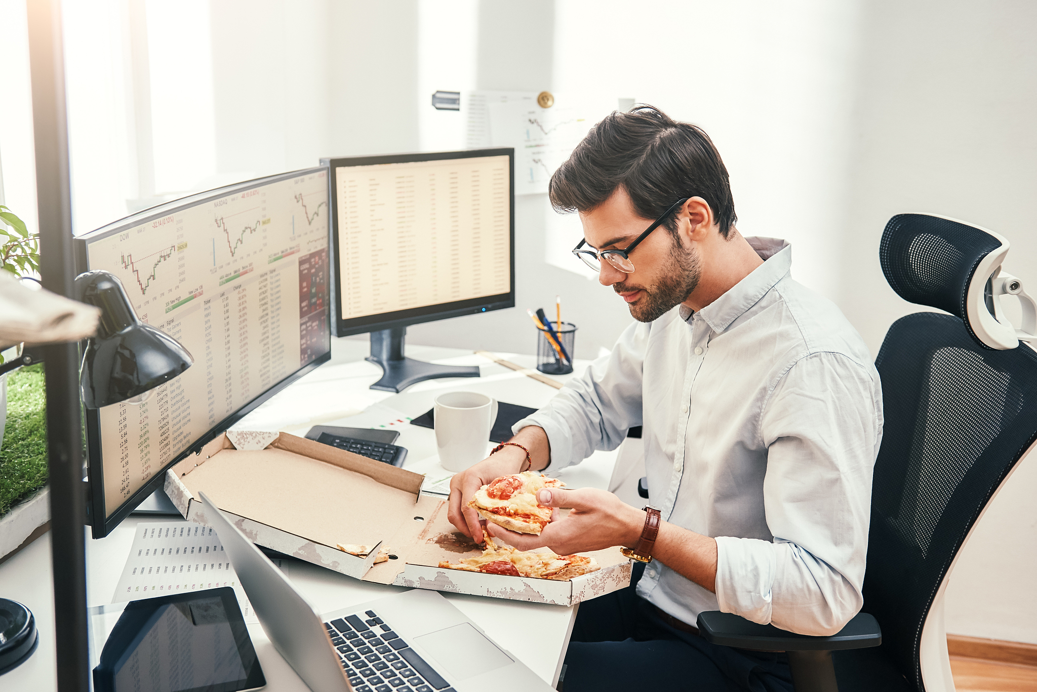 i love pizza! young bearded businessman or trader in eyewear and