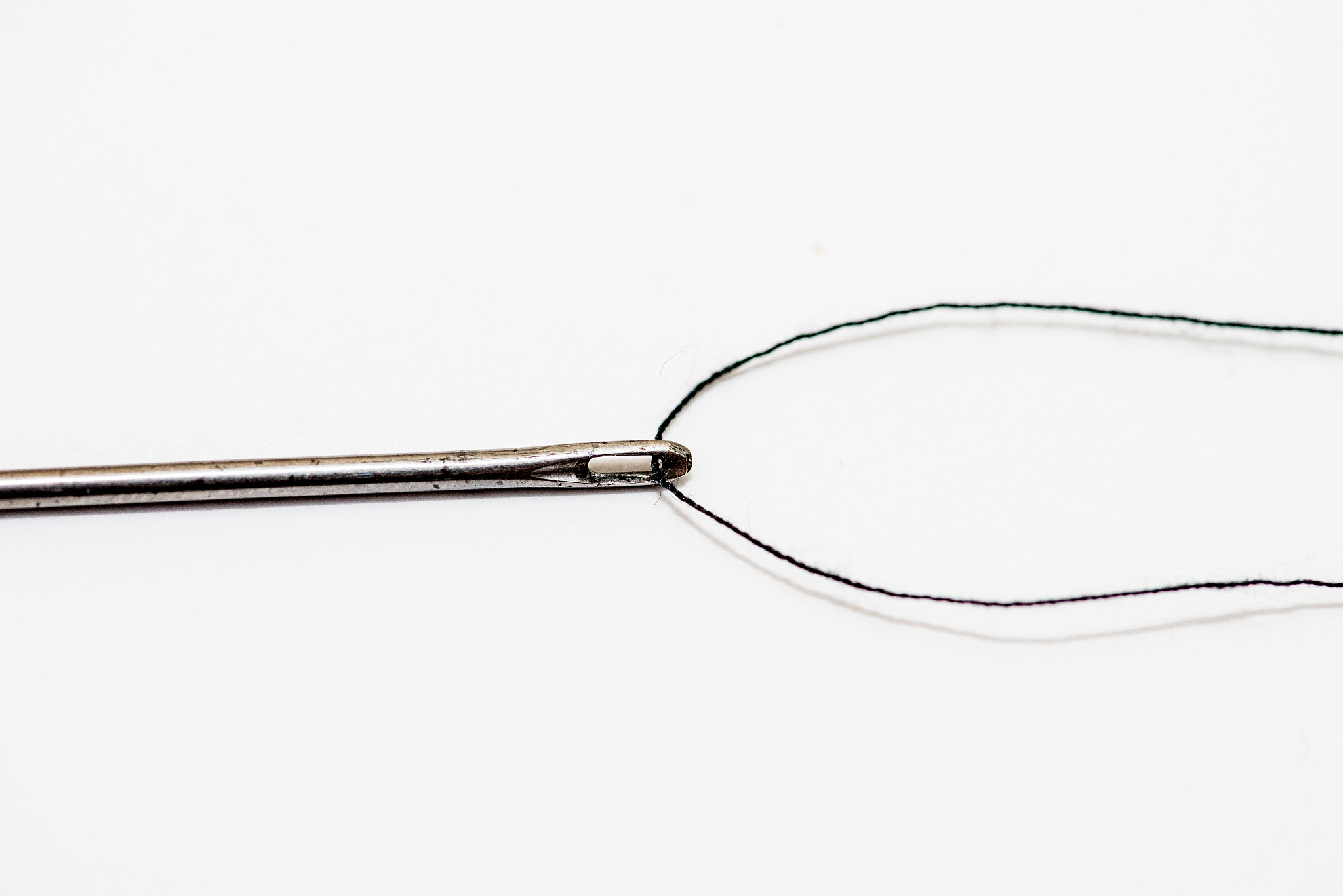 a metal needle. close-up, space for text