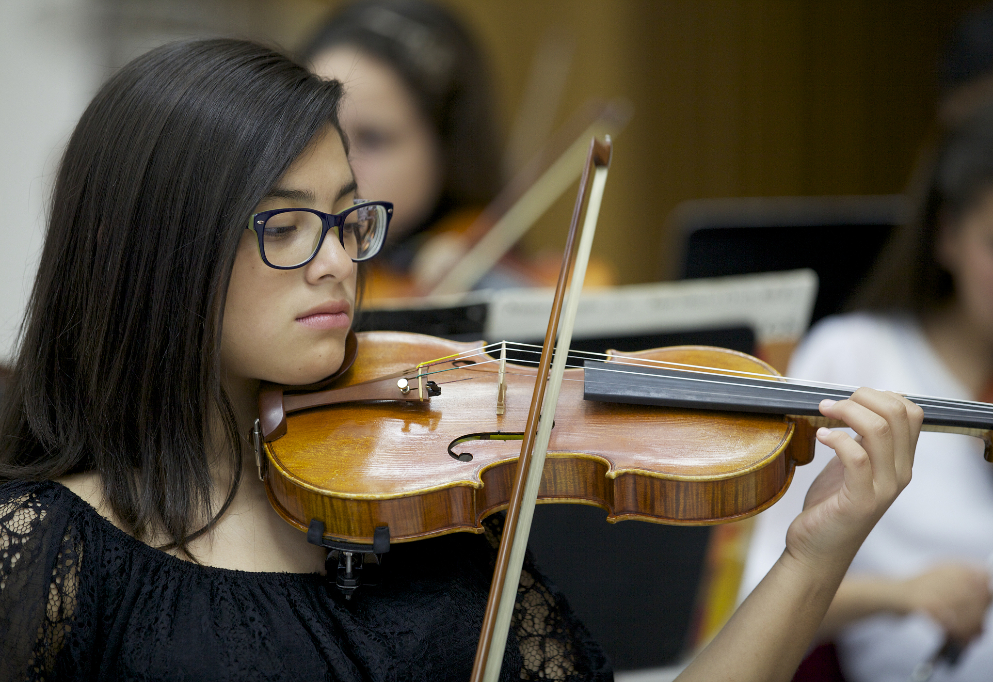 little girl  violin player  in  concert