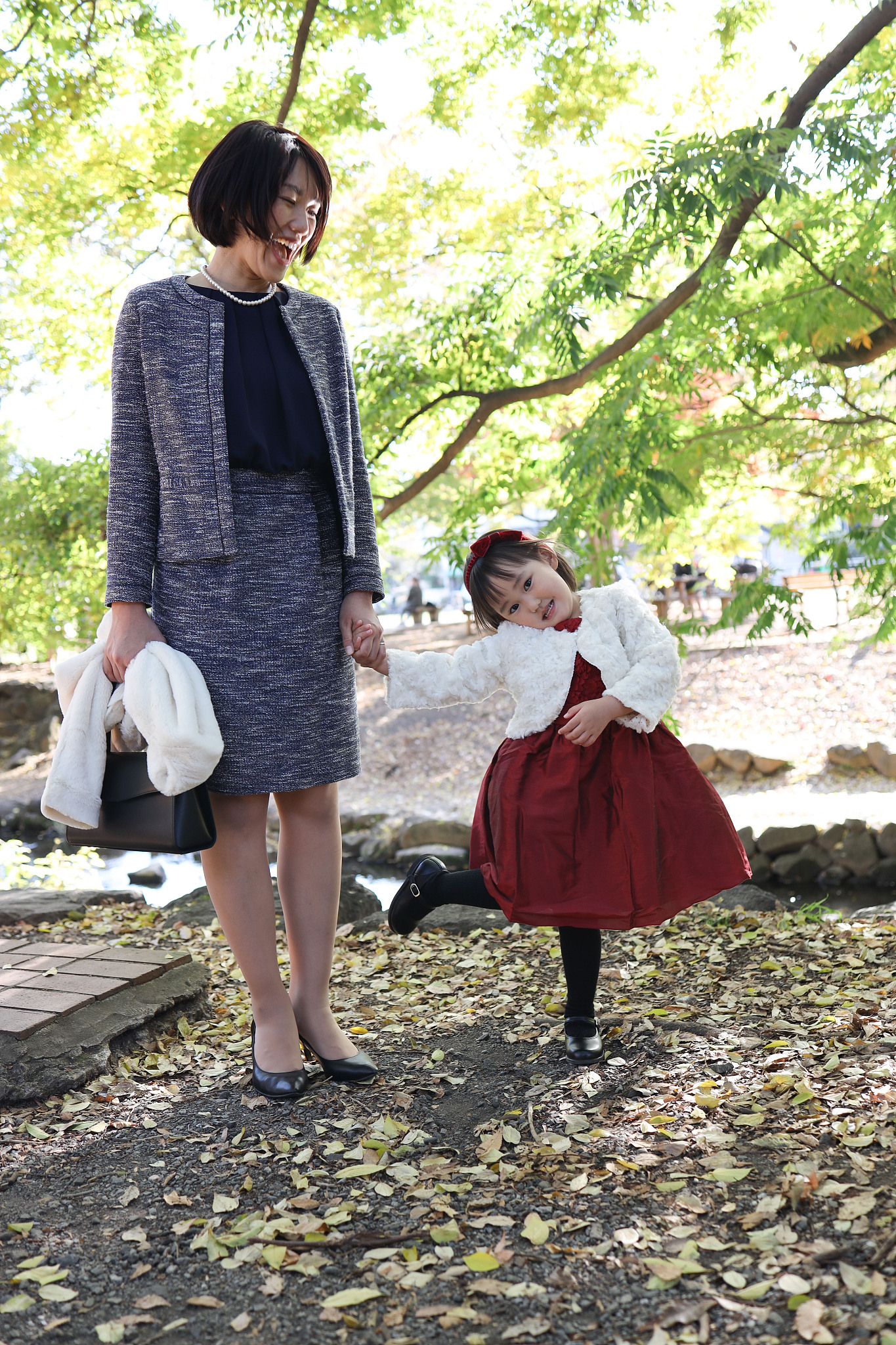 japanese mother walking  with her daughter at shichi go san cele