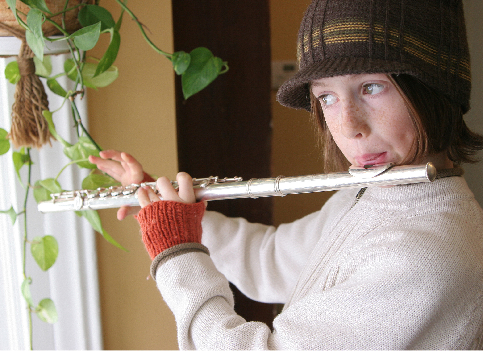 young flute player practicing