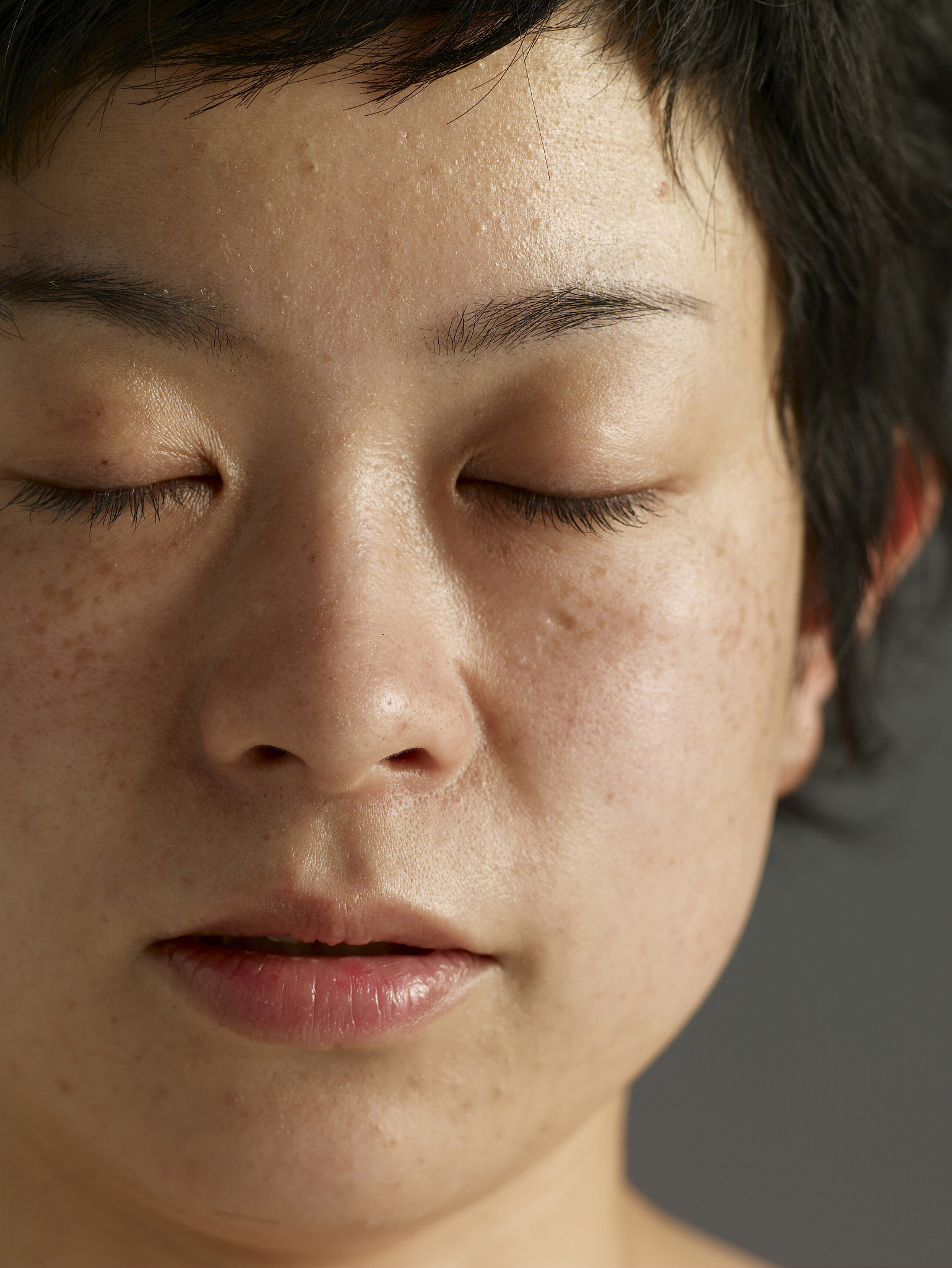close-up of woman, eyes closed