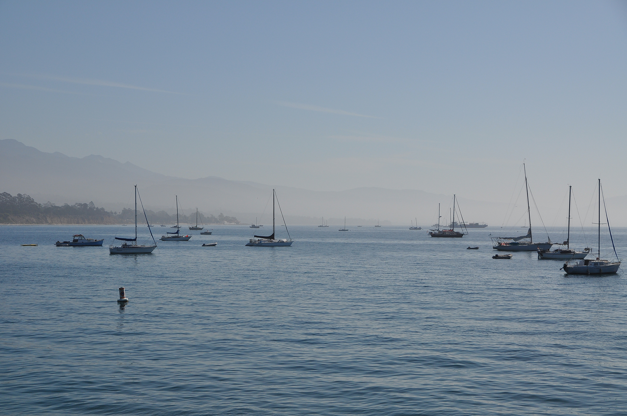 boats on sea against sky