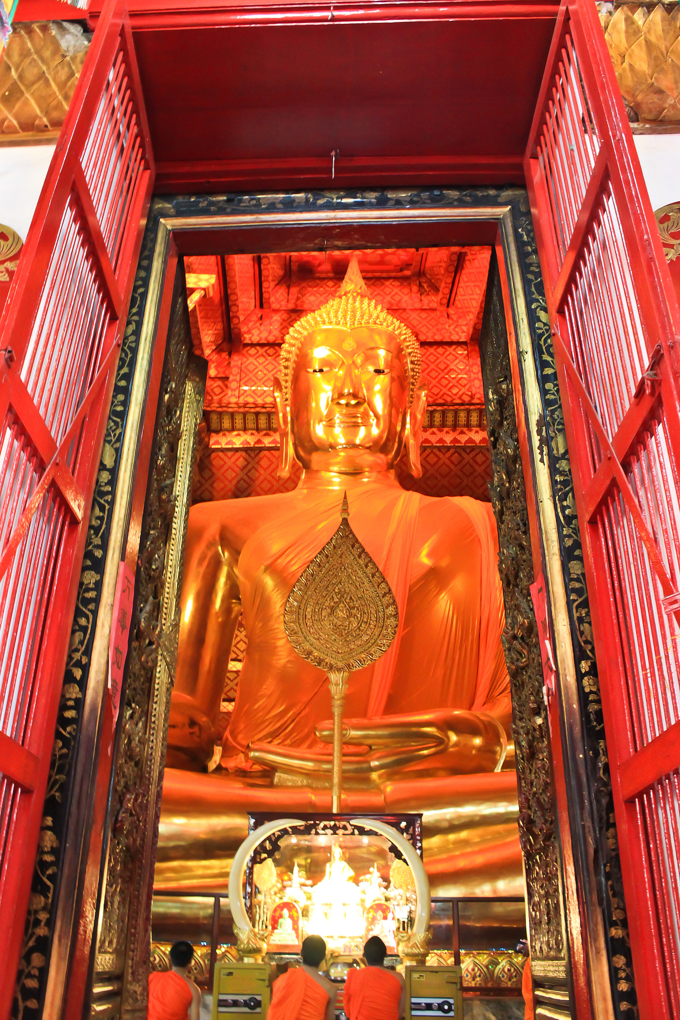 big golden buddha statue at the temple in ayutthaya, thailand