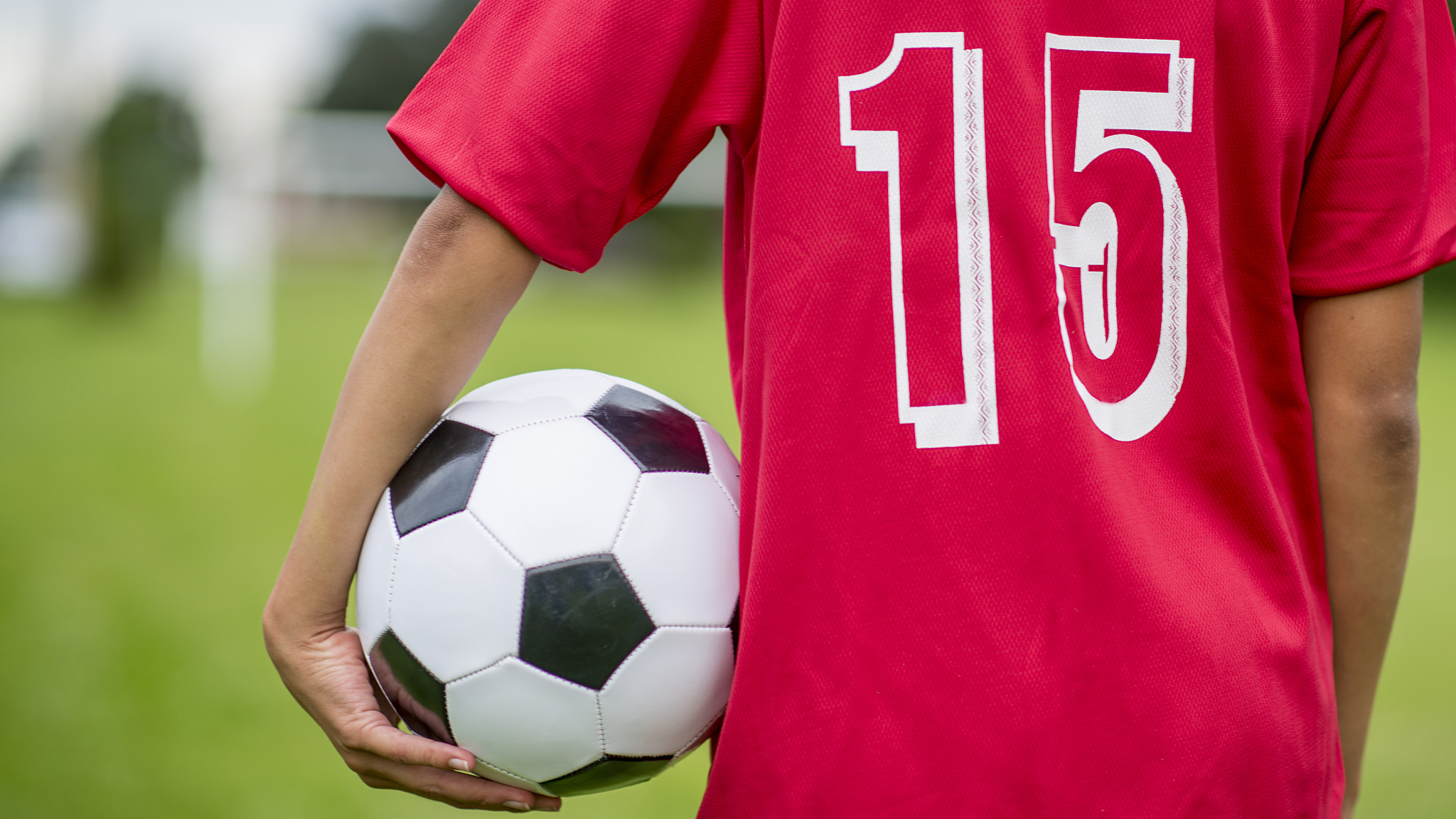 boy holding soccer ball
