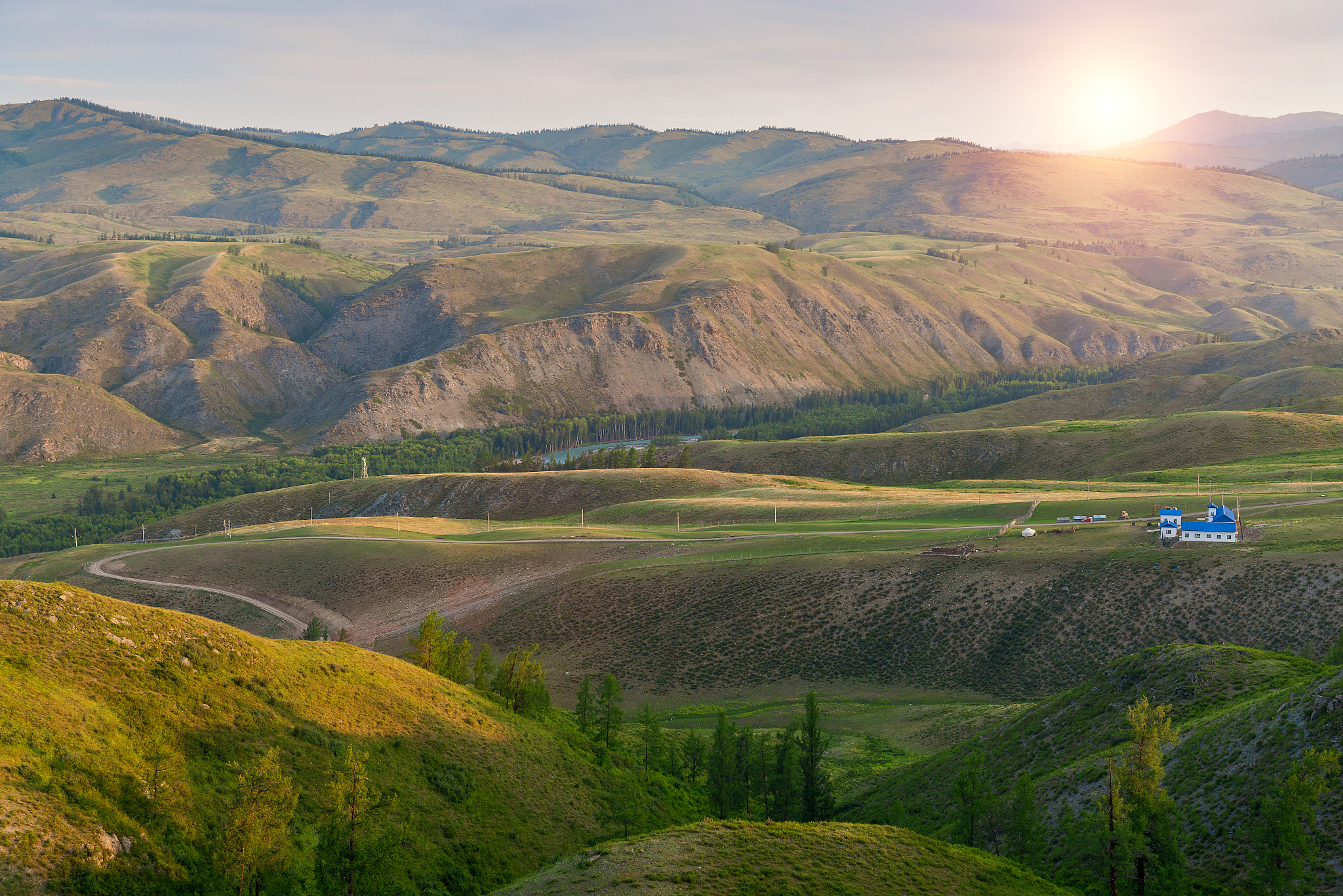 landscape of alpine meadow with sunrise scenery