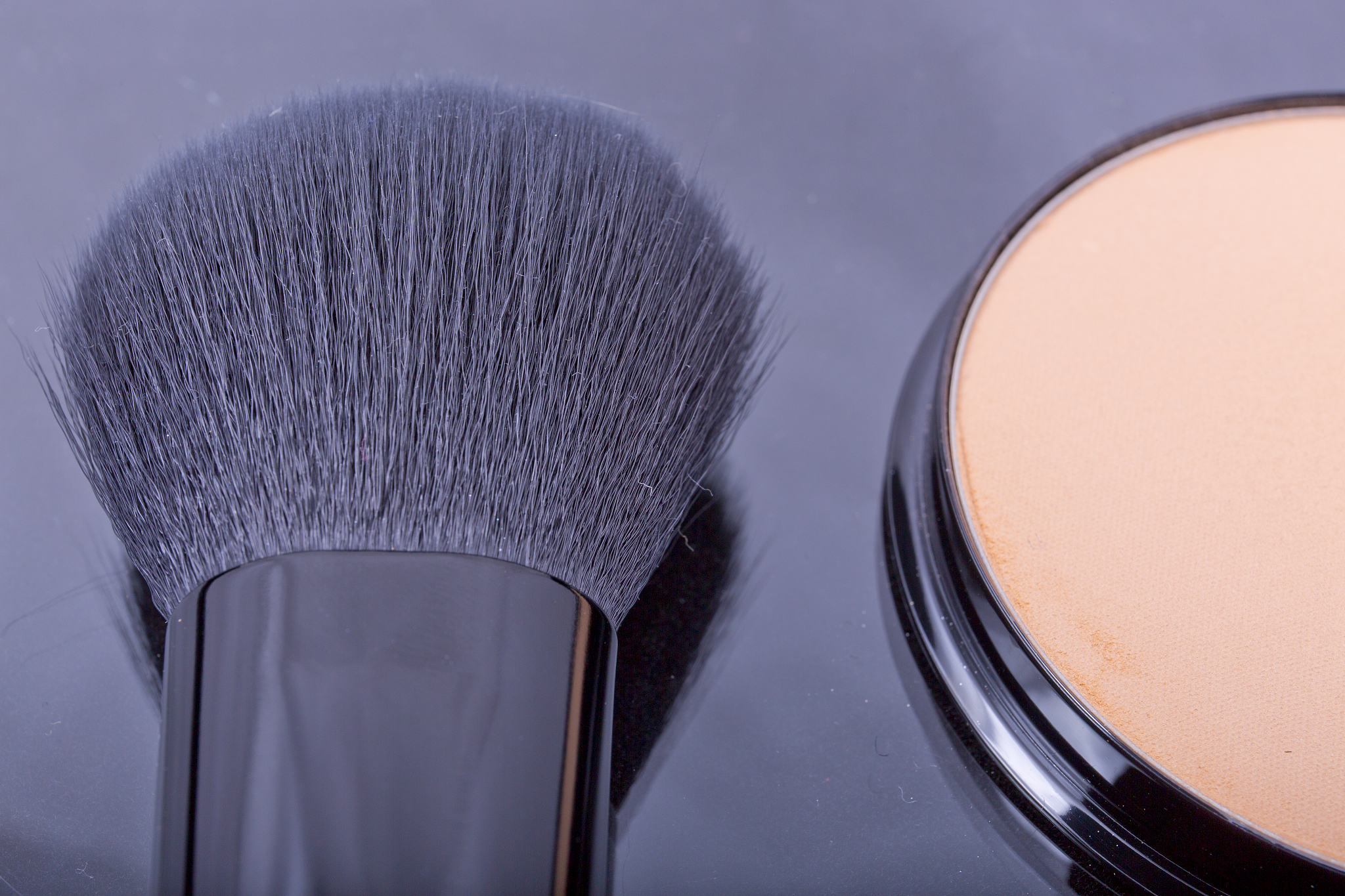 face powder with a brush