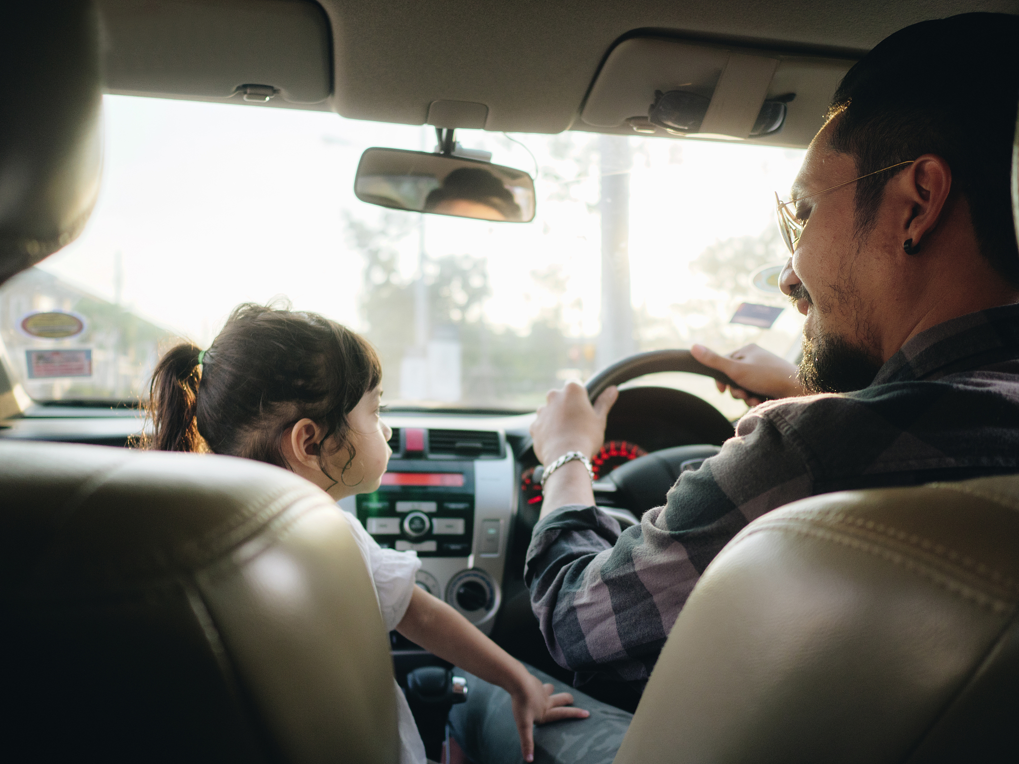 hipster father and daughter on the road trip