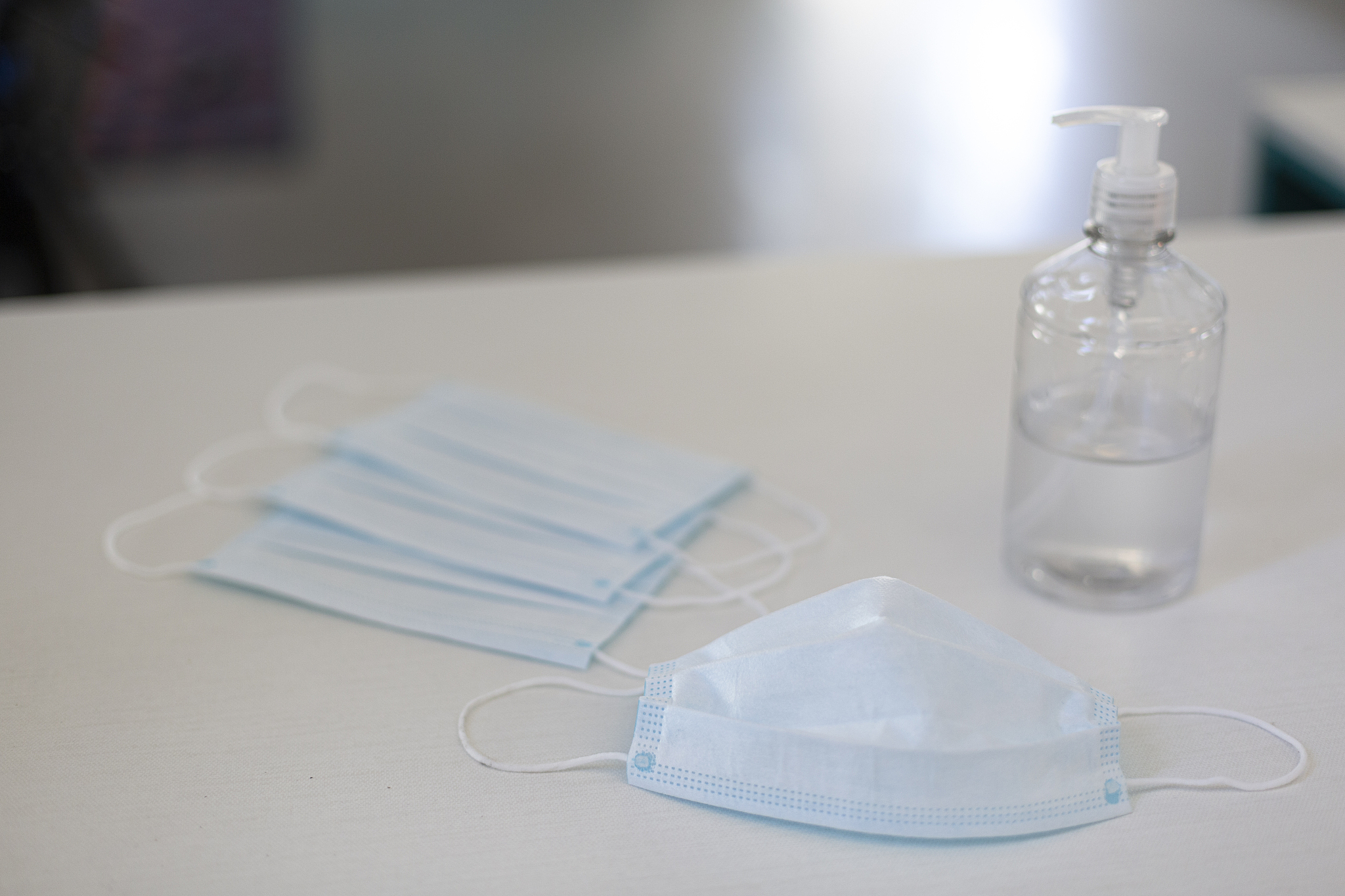 hand sanitizer and facial mask