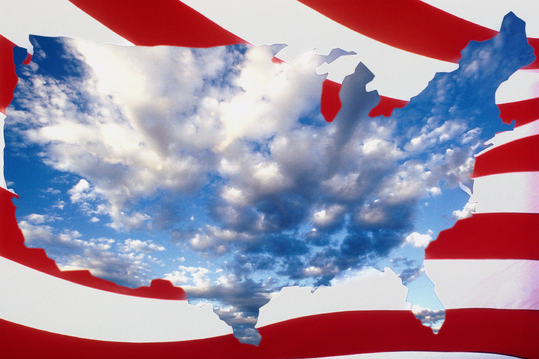 outline of usa superimposed on red and white stripes