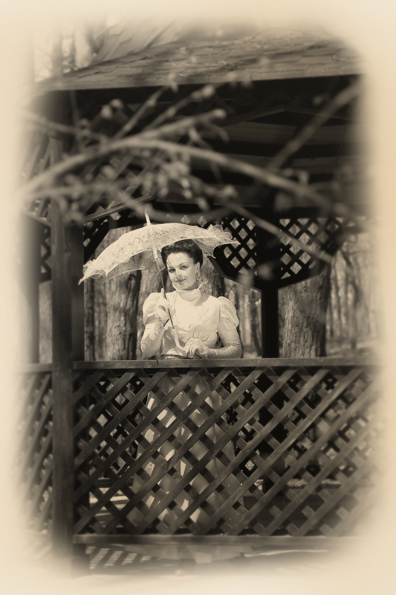 vintage photo of a young woman holding an umbrella