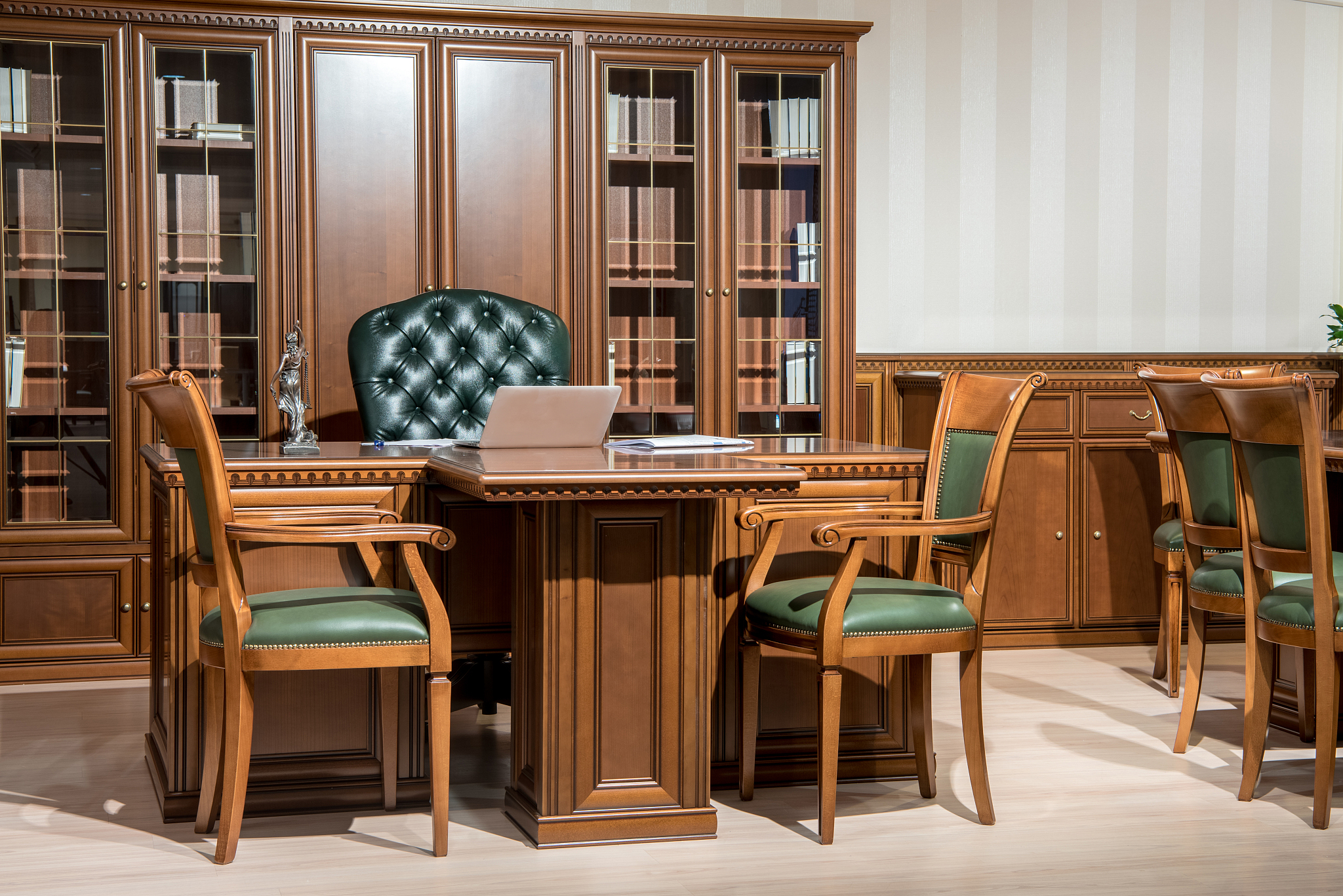 interior of office room with chairs and laptop on wooden table i