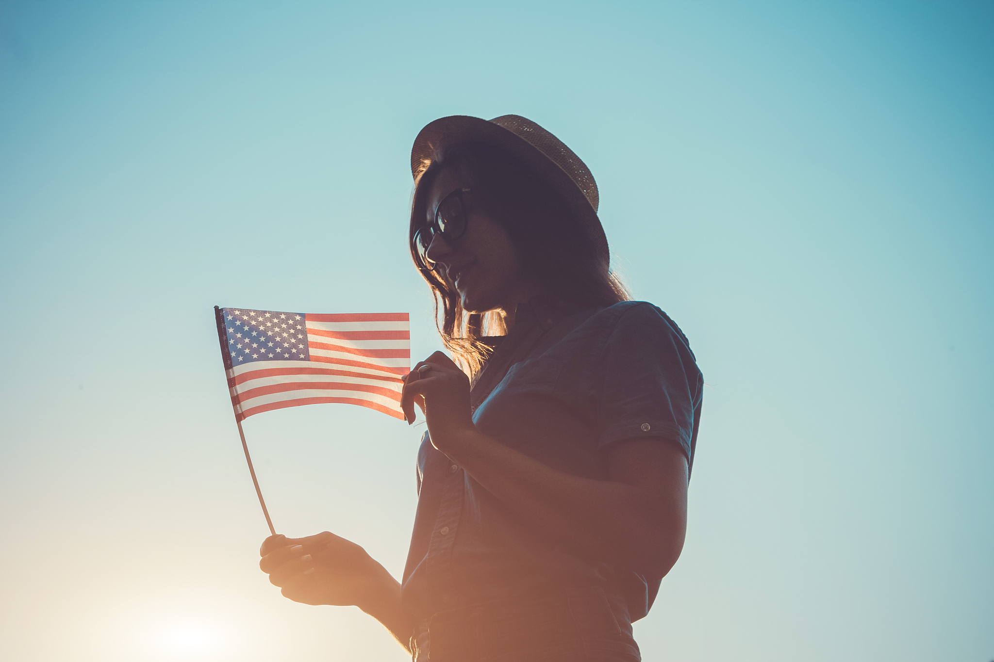 woman holding usa flag