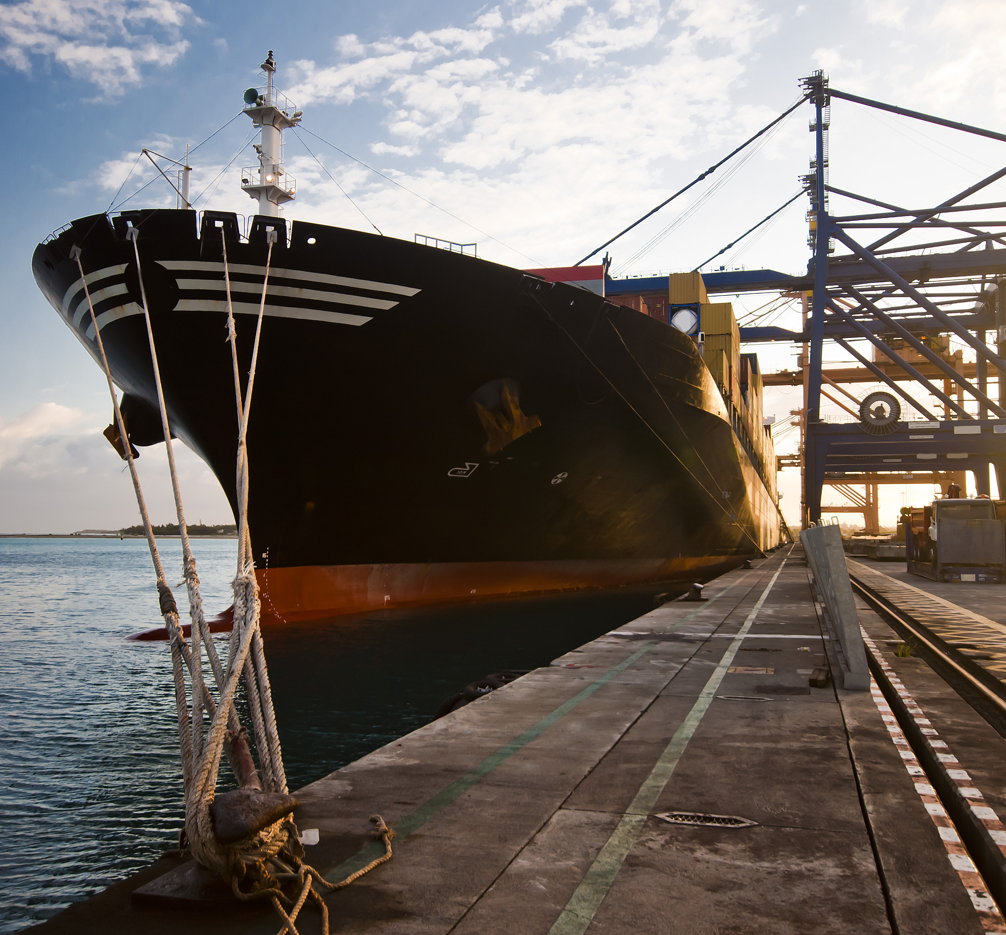 The cargo in the cargo hold was transferred to the conveyor belt by a grab and then transported to the receivers silos or warehouse At the end of discharging the bulldozer was employed in the car
